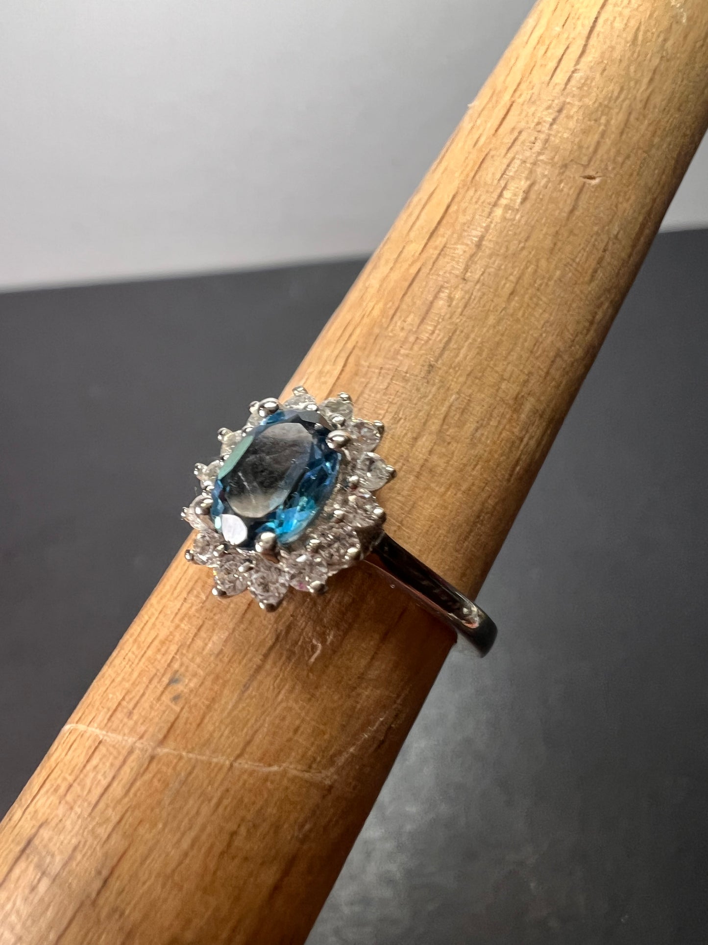 London blue topaz sunburst halo ring in platinum over sterling silver. ctw 1.40 size 5