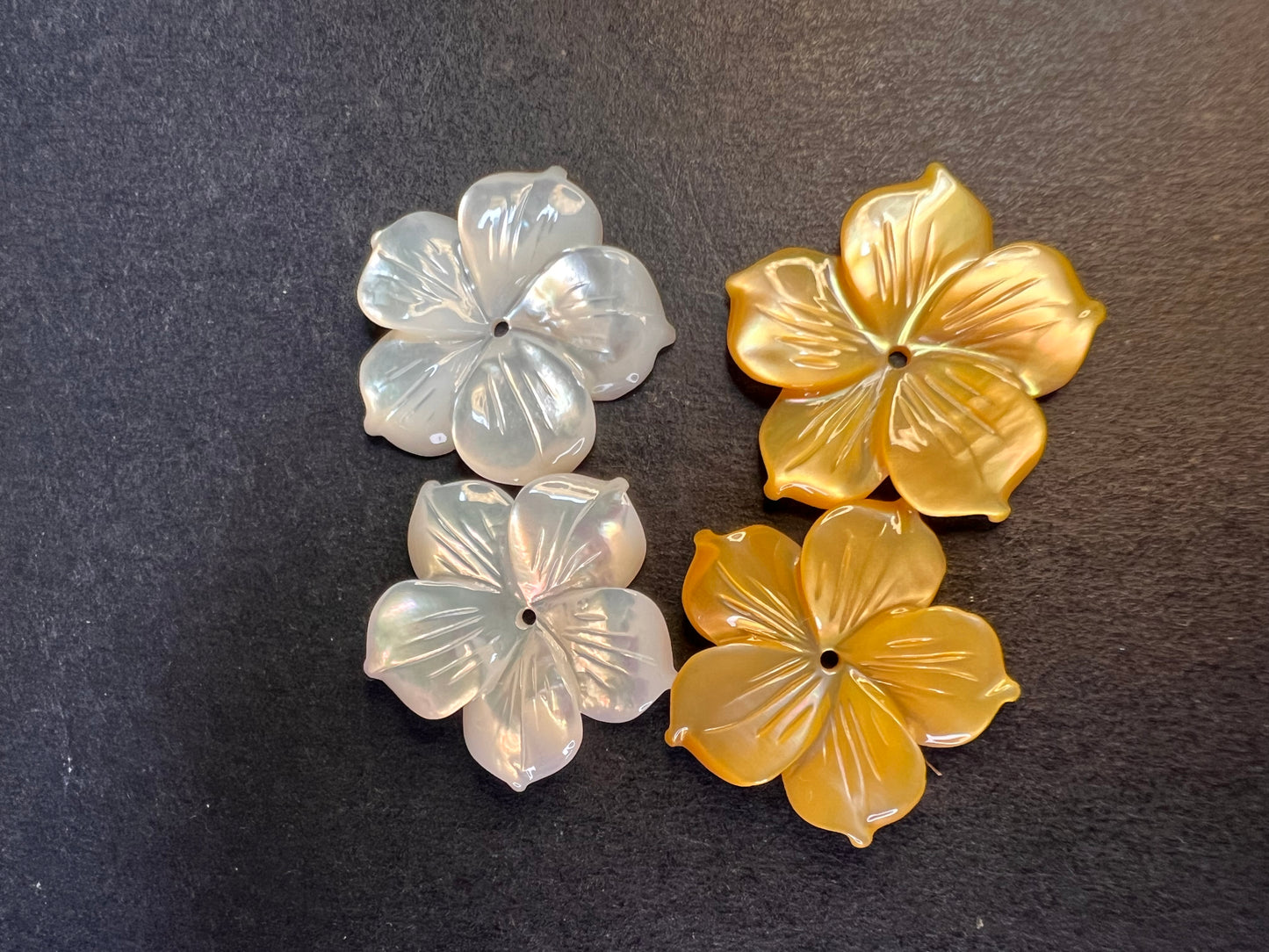 Vintage dead stock set of mother of pearl plumeria stud earrings in sterling silver