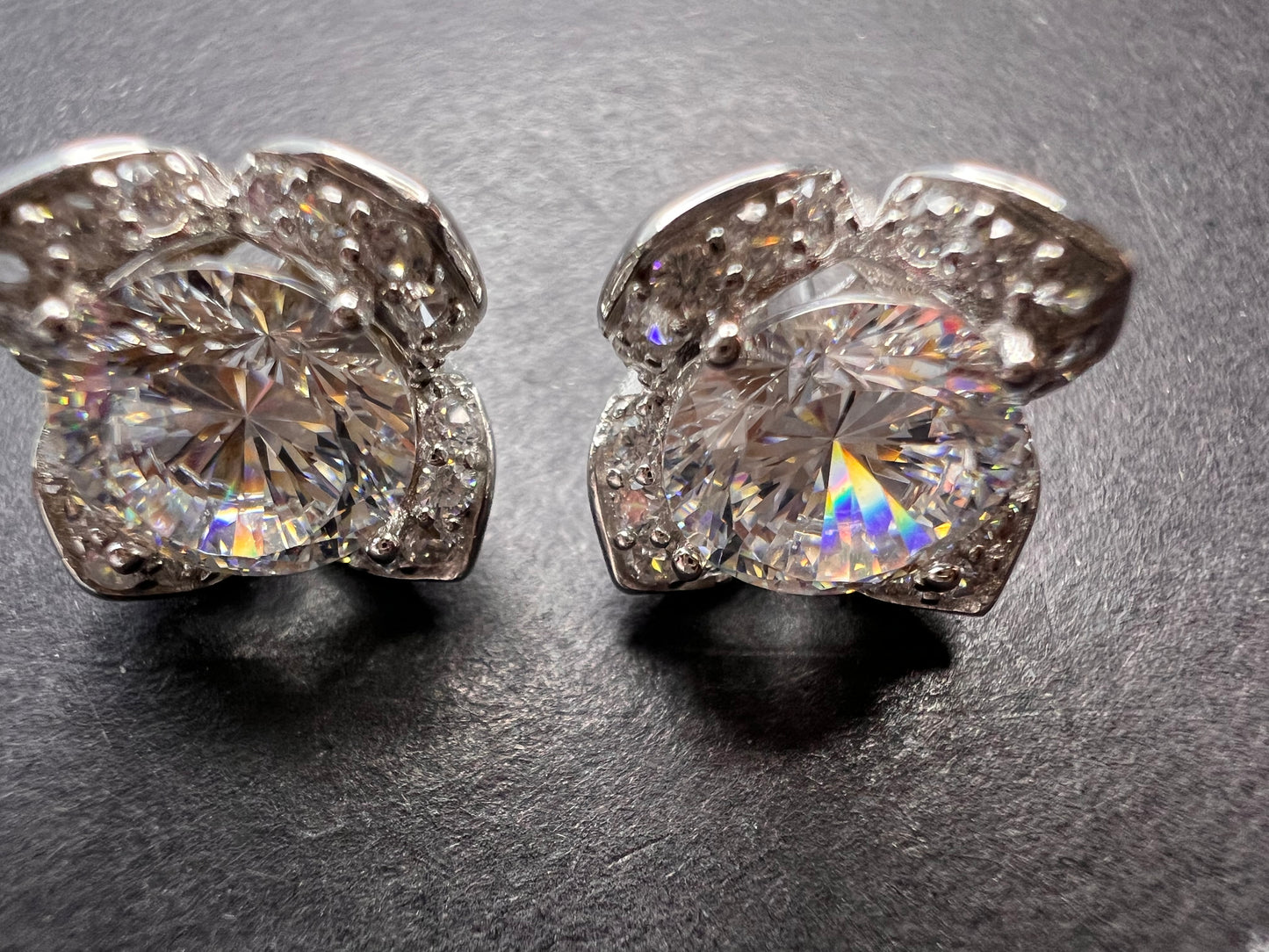 CZ floral styled stud earrings in rhodium over sterling silver