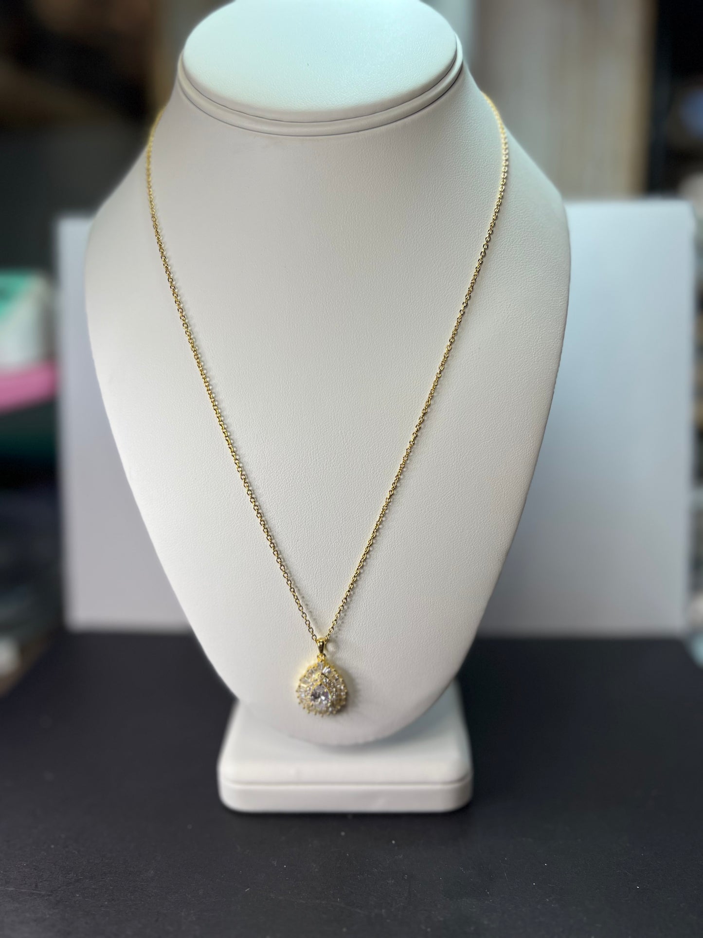 White CZ teardrop halo gold over Sterling pendant with gold over stainless steel chain necklace