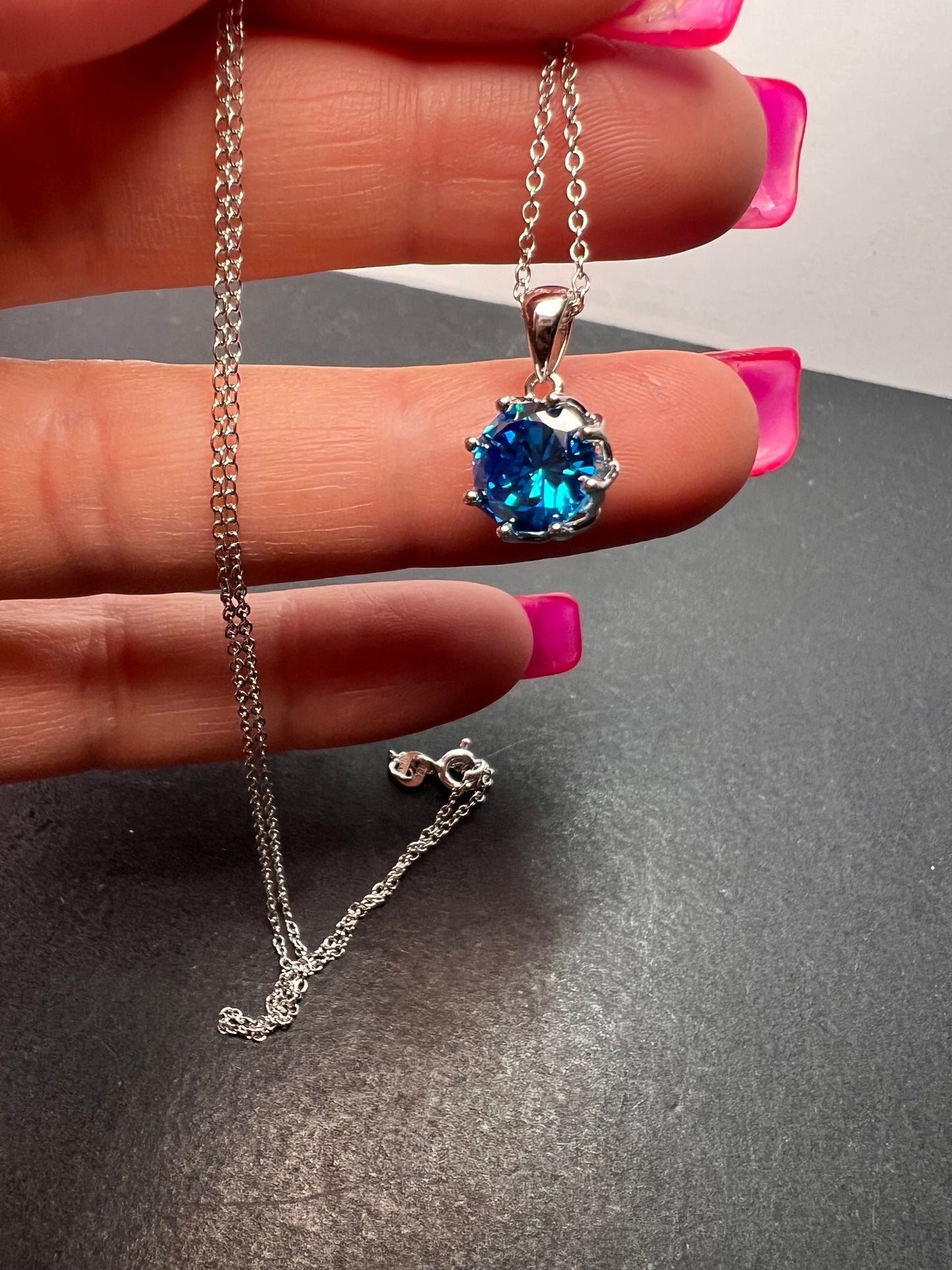 YGI blue CZ rhodium over sterling silver solitaire pendant and chain