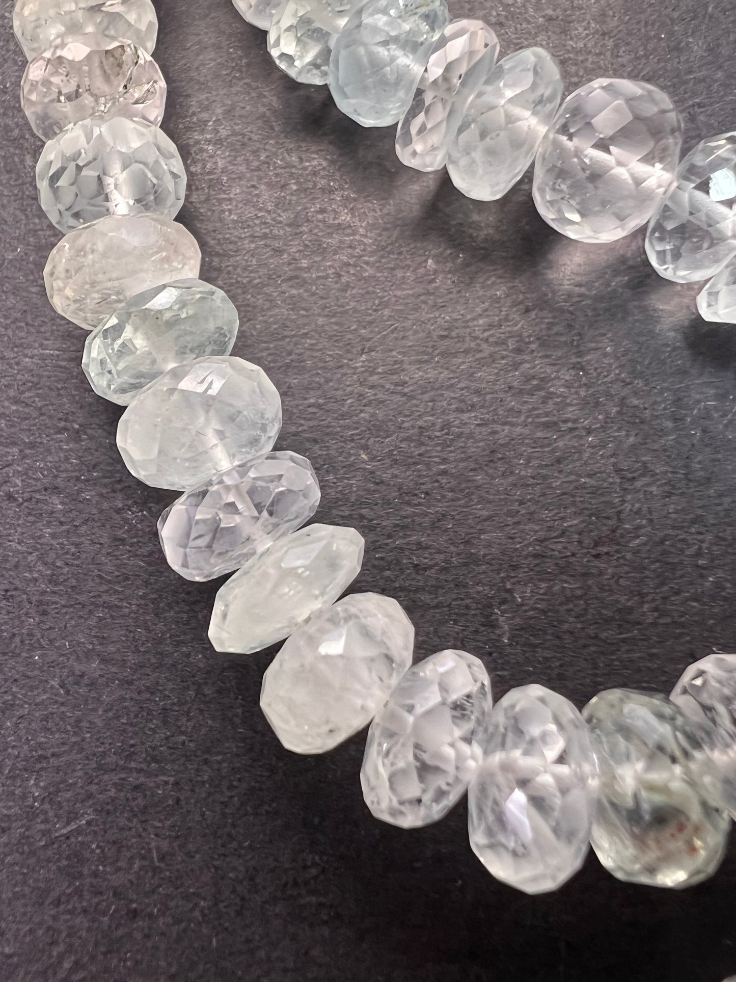 Natural aquamarine faceted rondelle graduated 20 inch necklace with platinum over sterling clasp