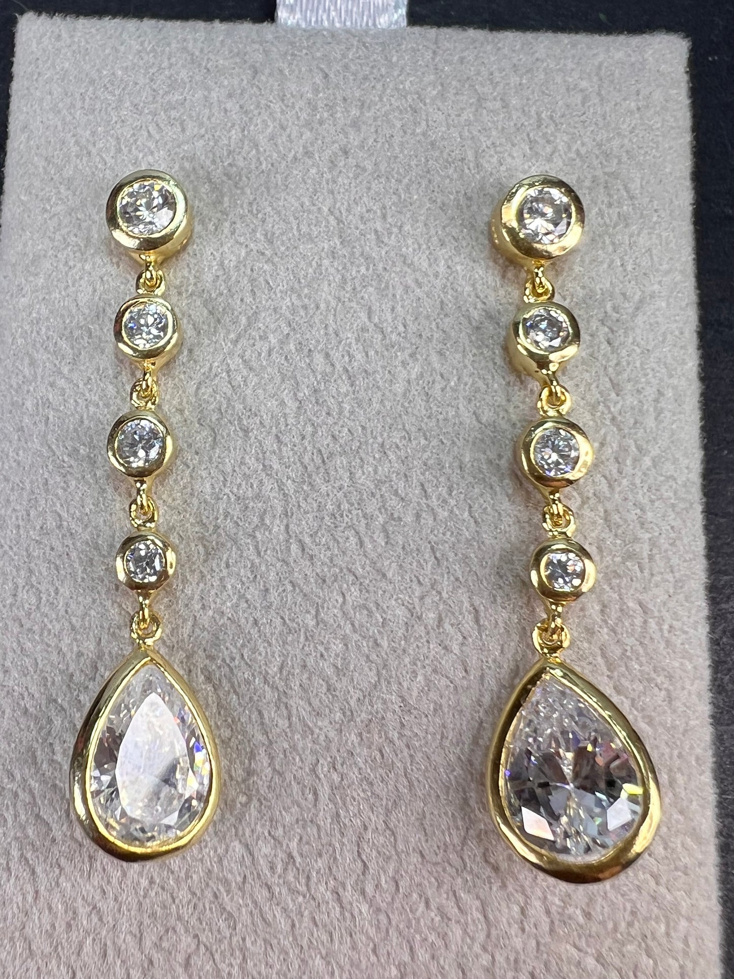 Long teardrop CZ earrings in gold over sterling silver