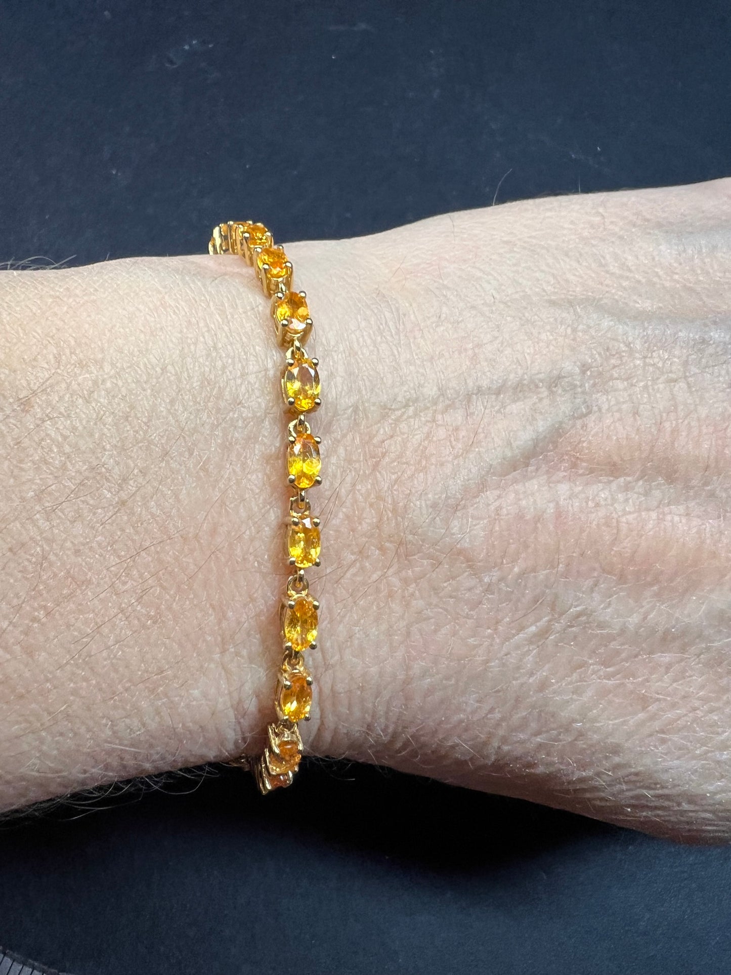 Yellow spessartine garnet tennis bracelet in gold over sterling silver
