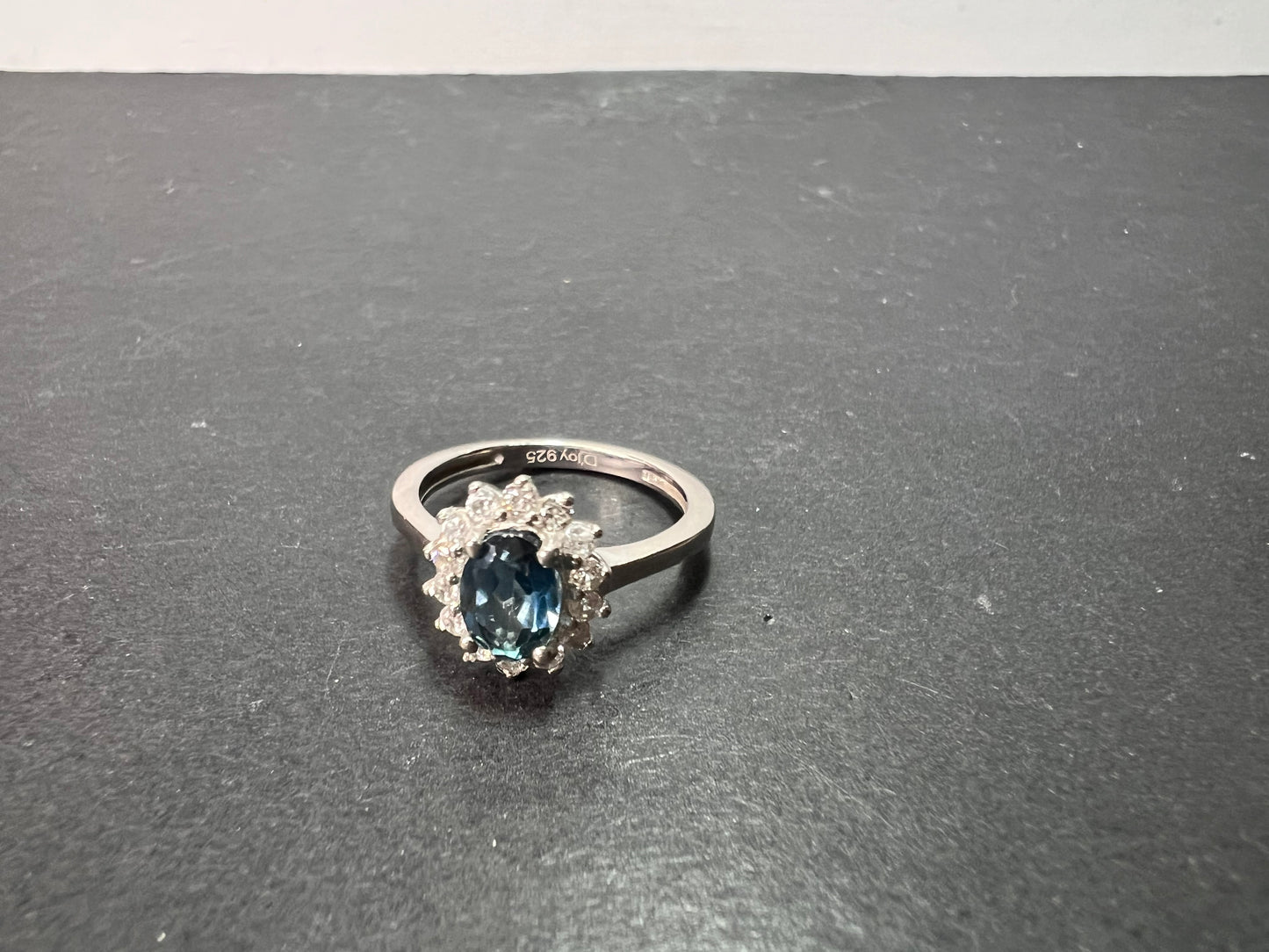 London blue topaz sunburst halo ring in platinum over sterling silver. ctw 1.40 size 5