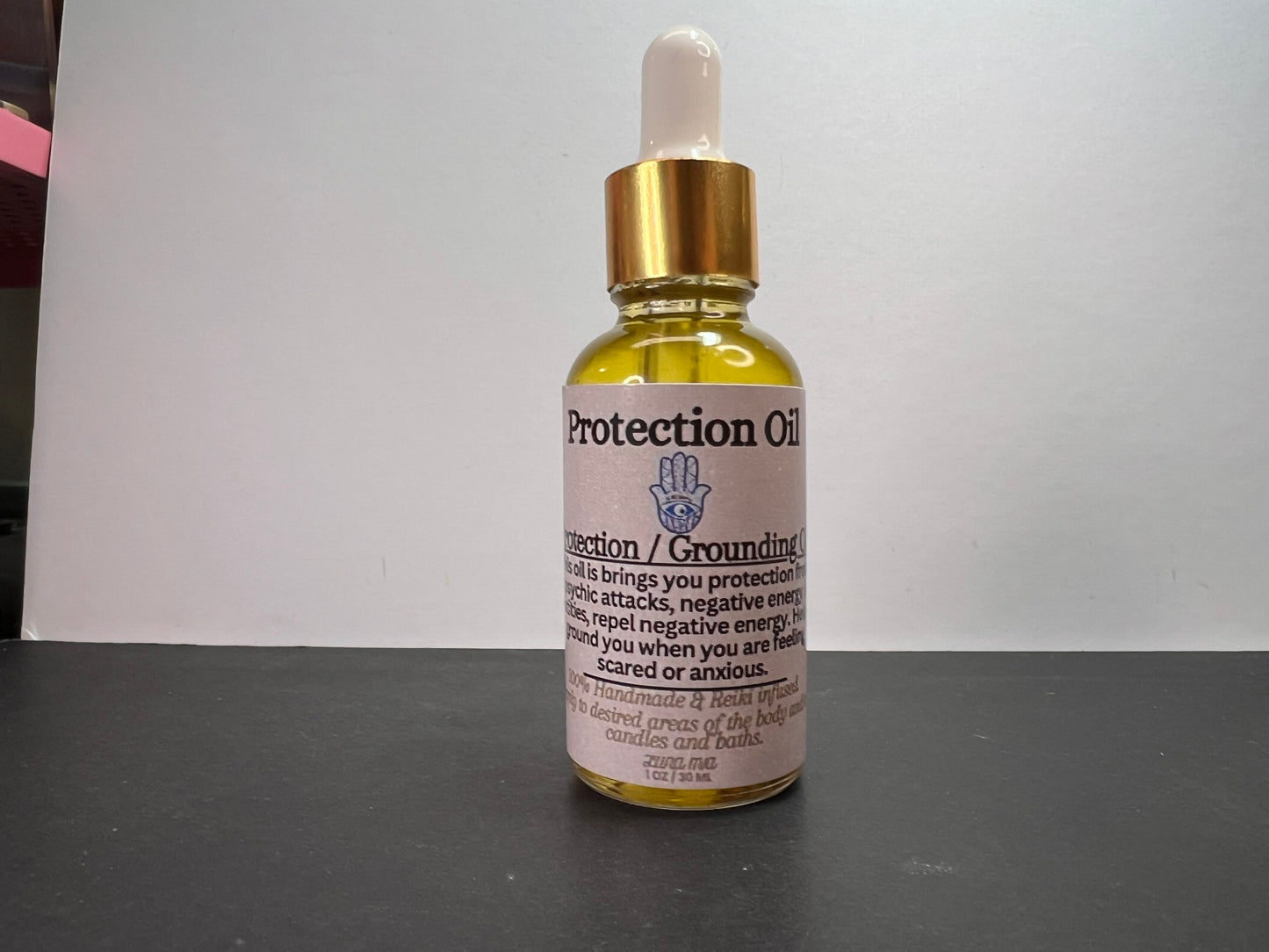 Protection and grounding oil by Luna Mia