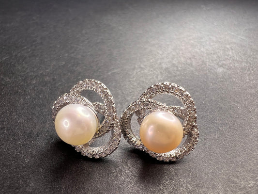 Cultured pearl swirl stud earrings in sterling silver with cz accents