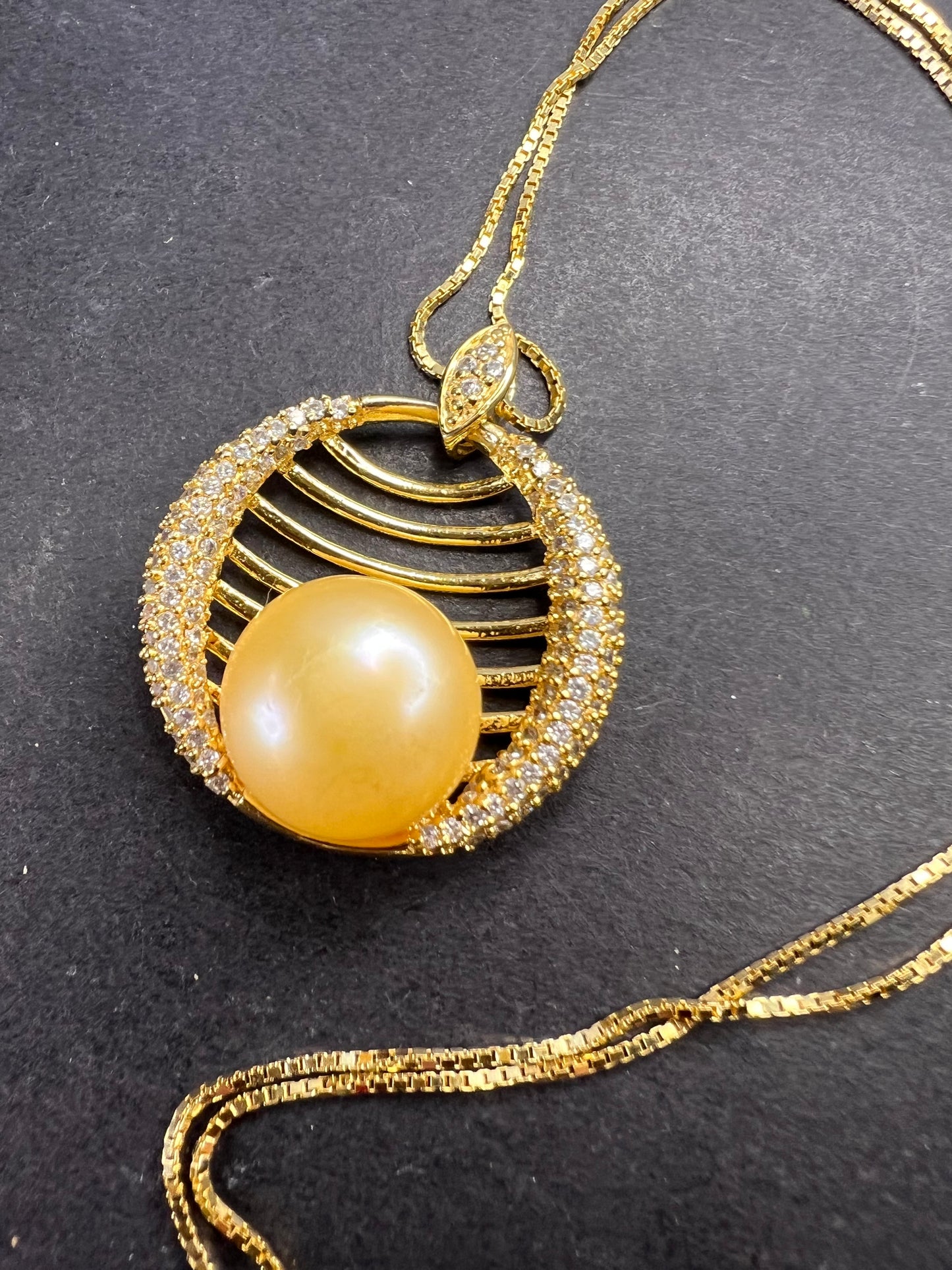 Golden yellow cultured pearl pendant in gold over sterling silver with chain