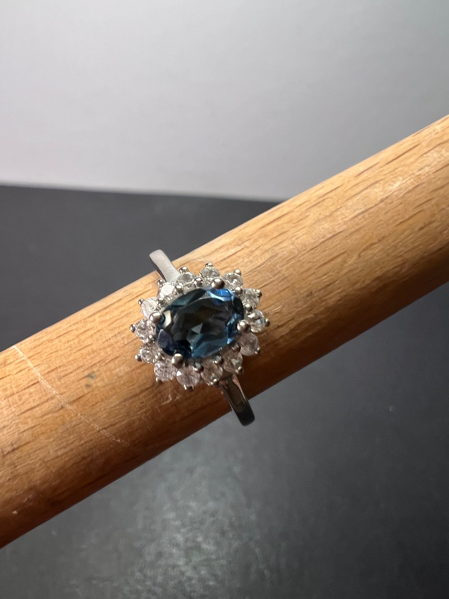 London blue topaz sunburst halo ring in platinum over sterling silver. ctw 1.40 size 5