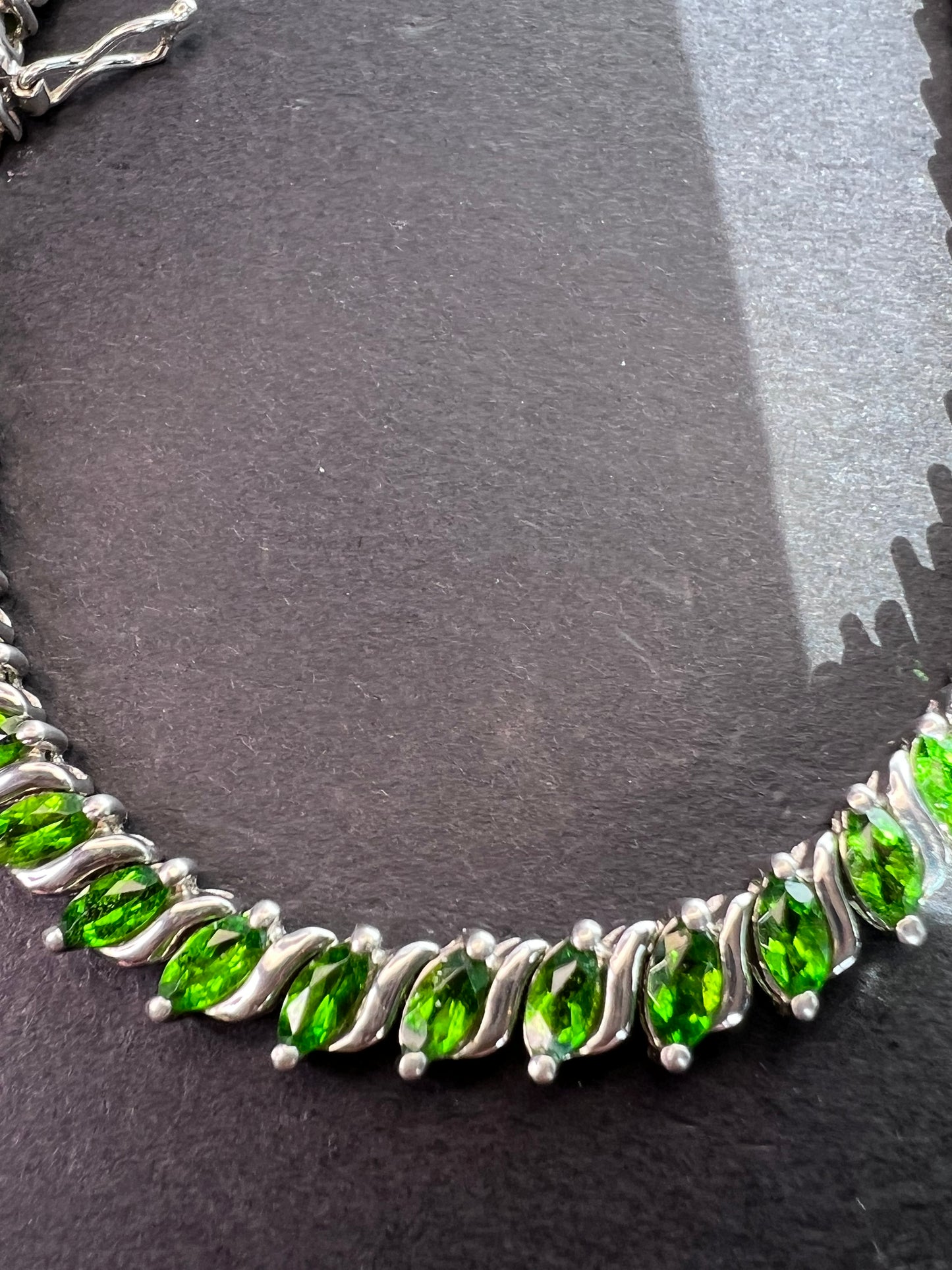 Chrome diopside tennis bracelet in rhodium over sterling silver