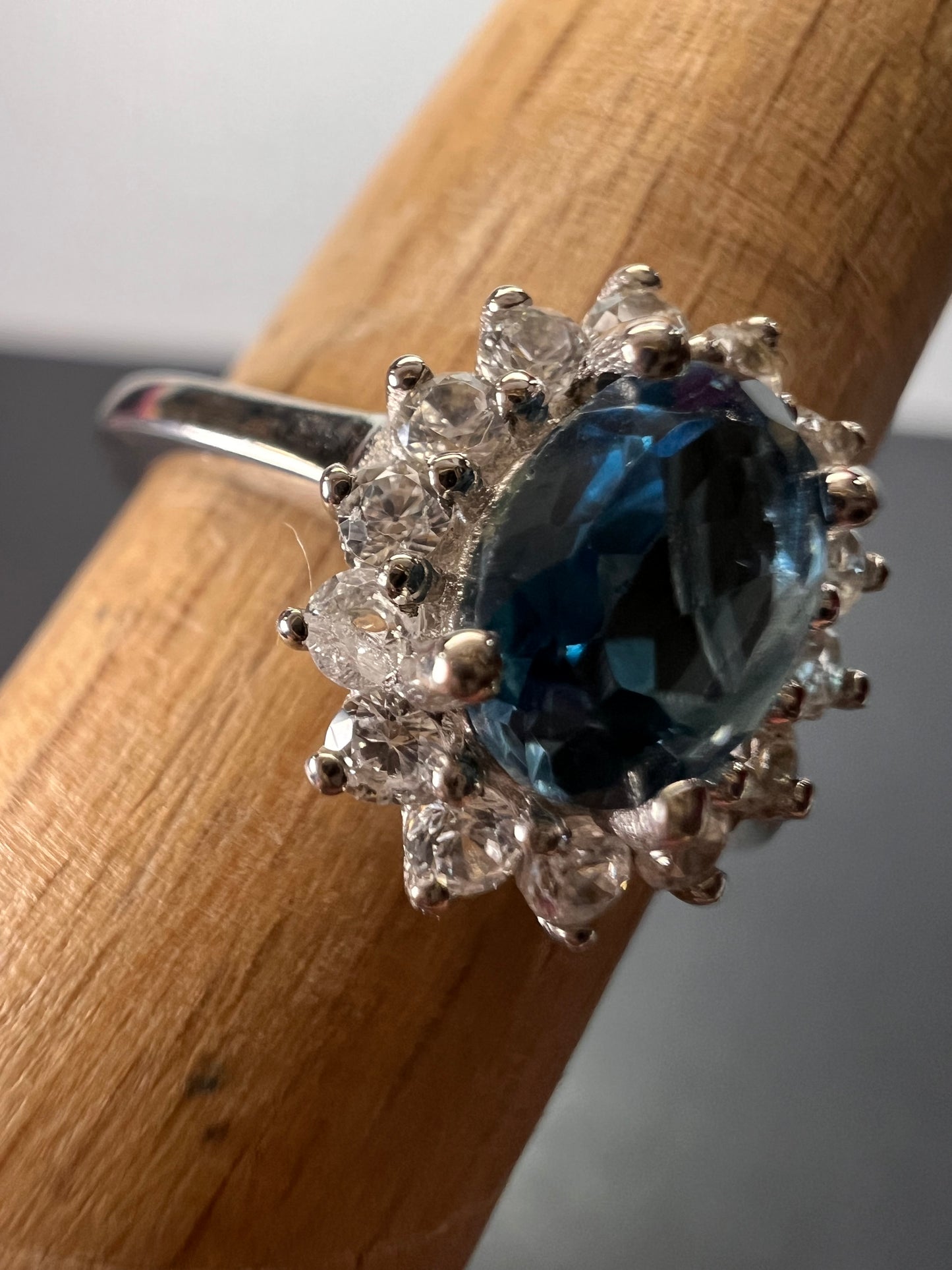 London blue topaz sunburst halo ring in platinum over sterling silver. ctw 1.40 size 5