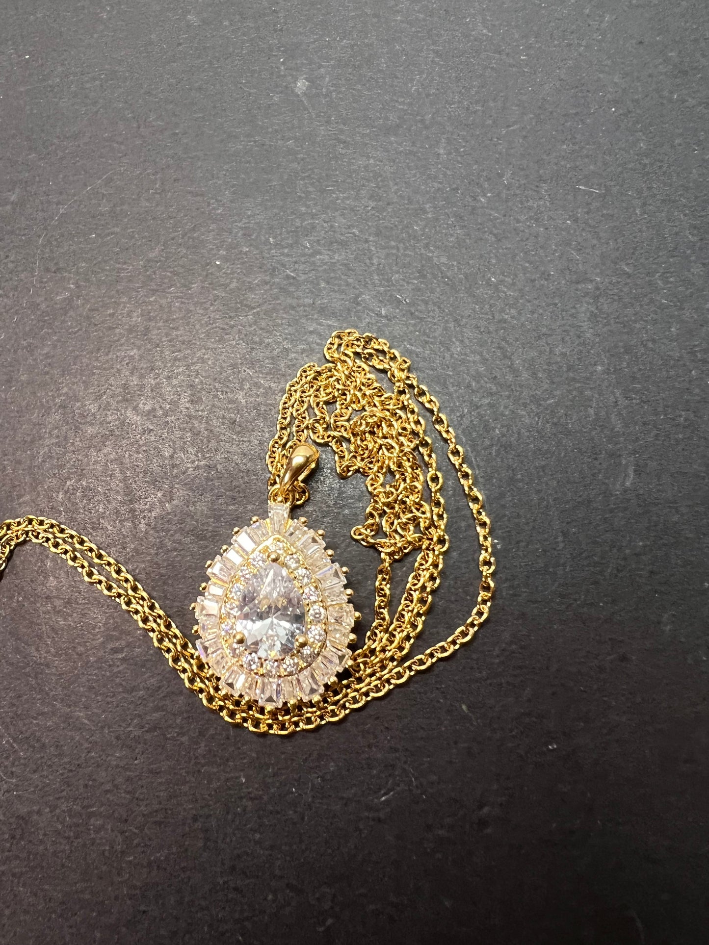 White CZ teardrop halo gold over Sterling pendant with gold over stainless steel chain necklace