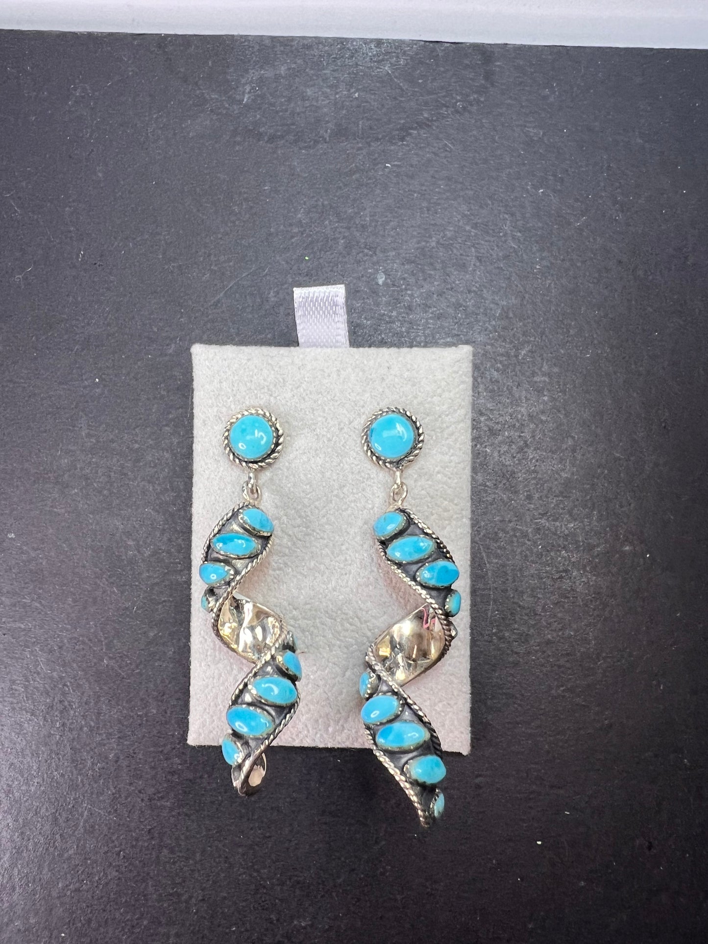 Santa Fe style Kingman turquoise swirl twisted drop sterling silver earrings