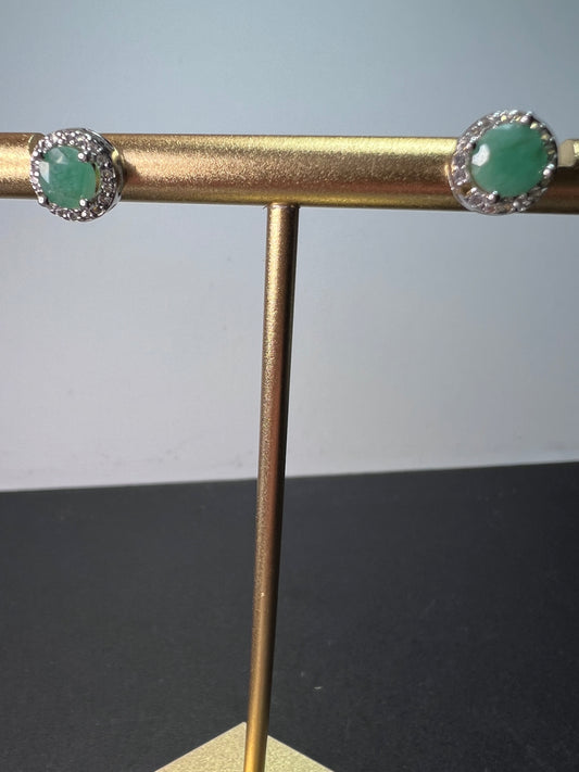 Emerald and zircon halo stud earrings in sterling silver