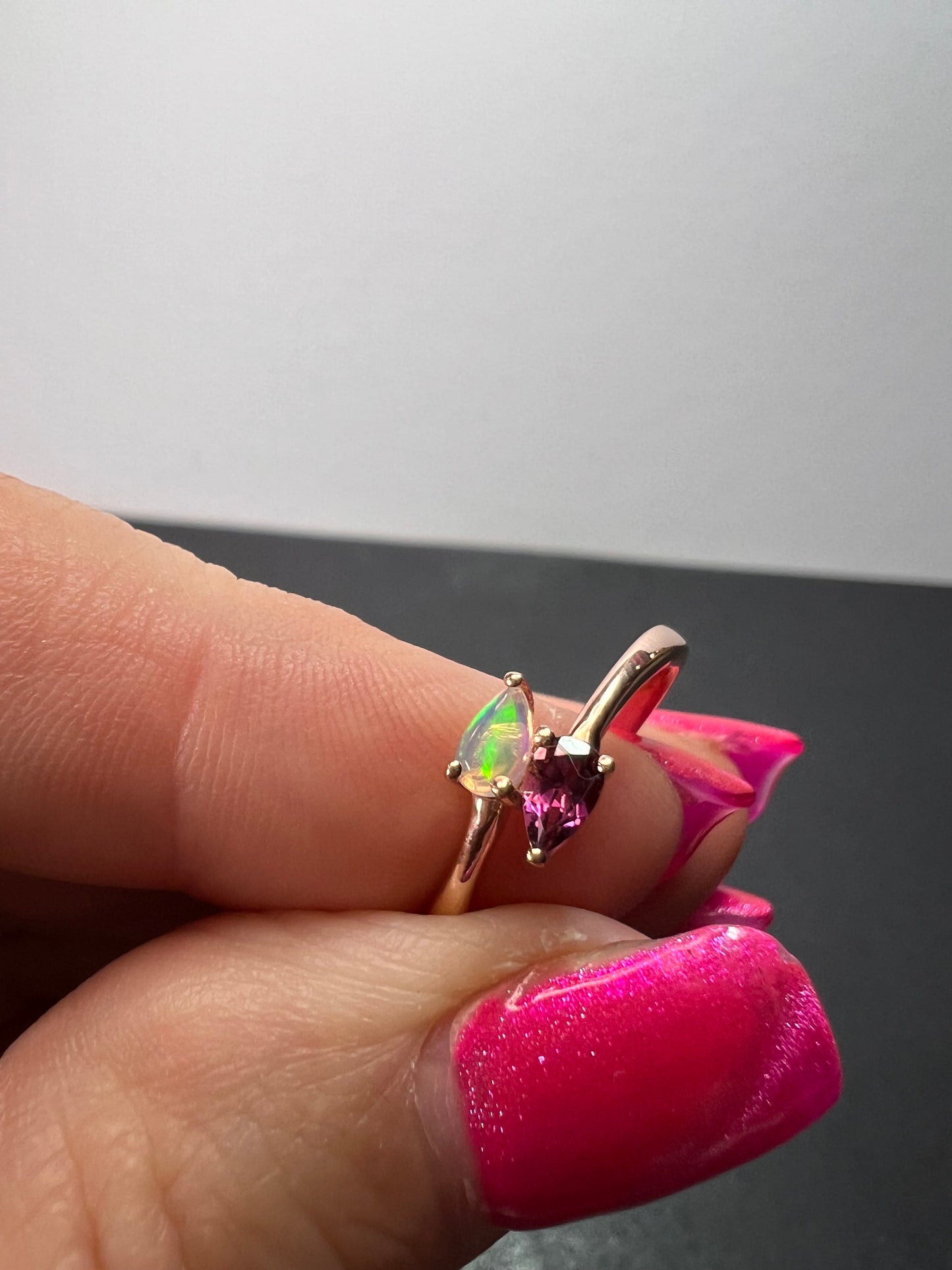 Rubellite and Ethiopian welo opal bypass ring in rose gold vermeil over sterling silver size 7. .35ctw