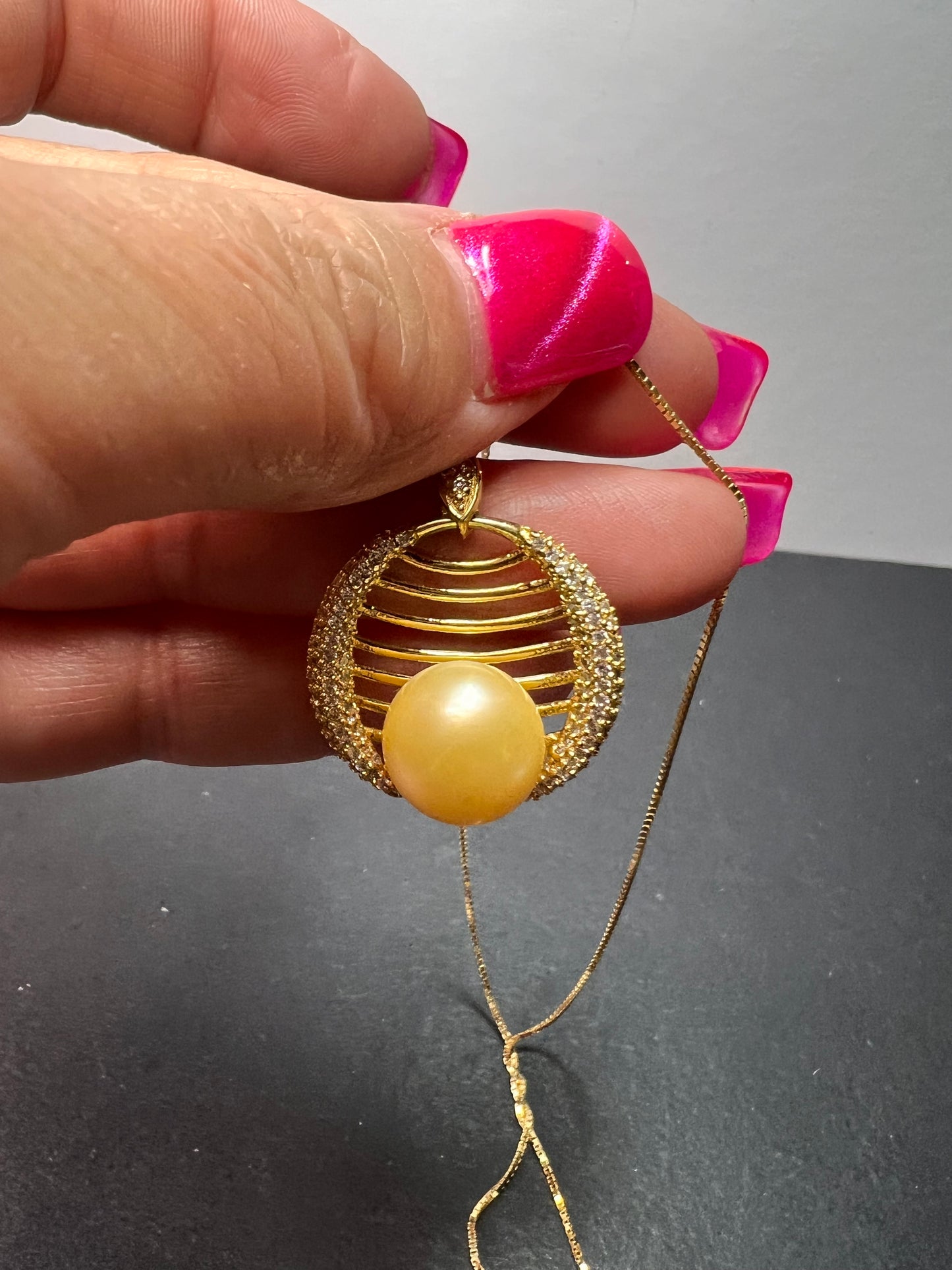 Golden yellow cultured pearl pendant in gold over sterling silver with chain