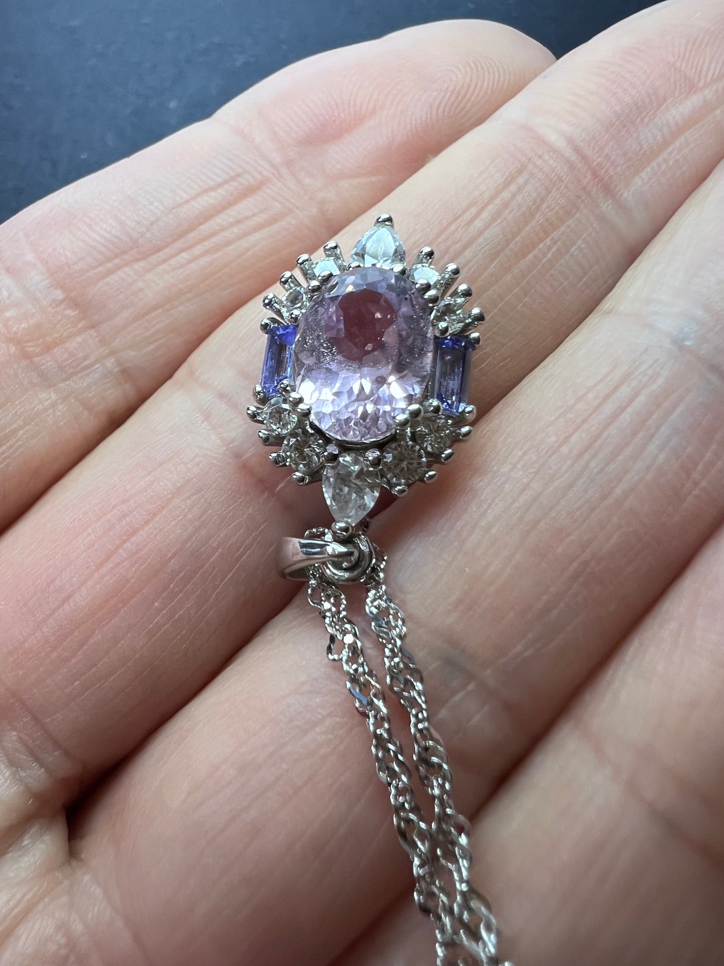 2.11ct Kunzite, 0.18ctw Tanzanite And 0.87ctw White Zircon Rhodium Over Silver halo Pendant With Chain