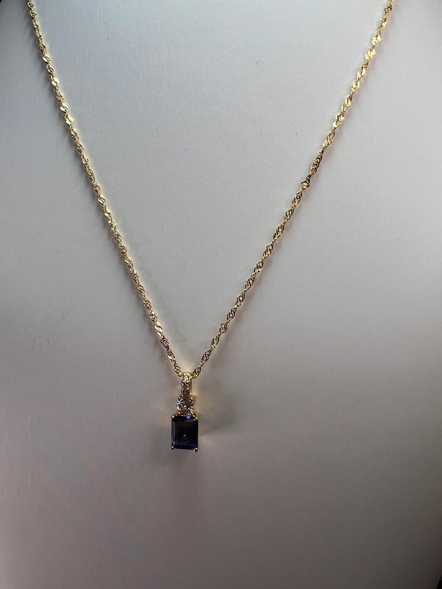 Blue emerald cut CZ pendant and chain necklace in gold over sterling silver 18 inches