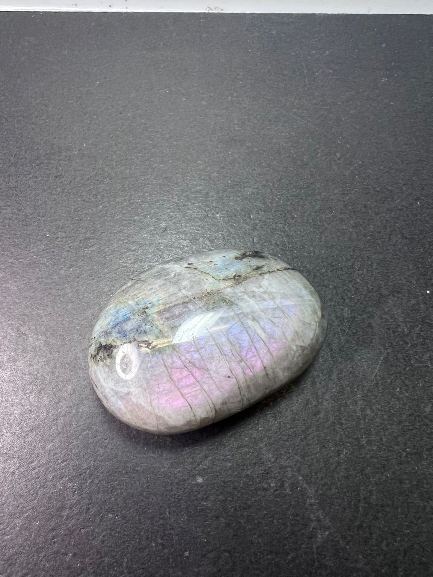 Labradorite with pink and purple rainbow flash