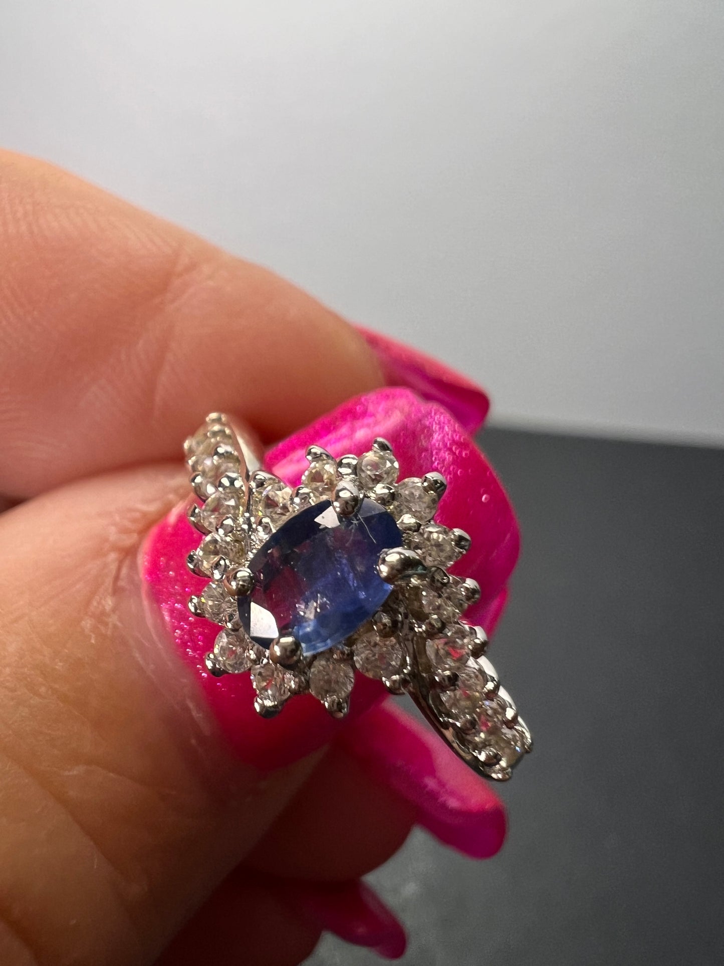 Blue sapphire and zircon floral ring in platinum over sterling silver size 5