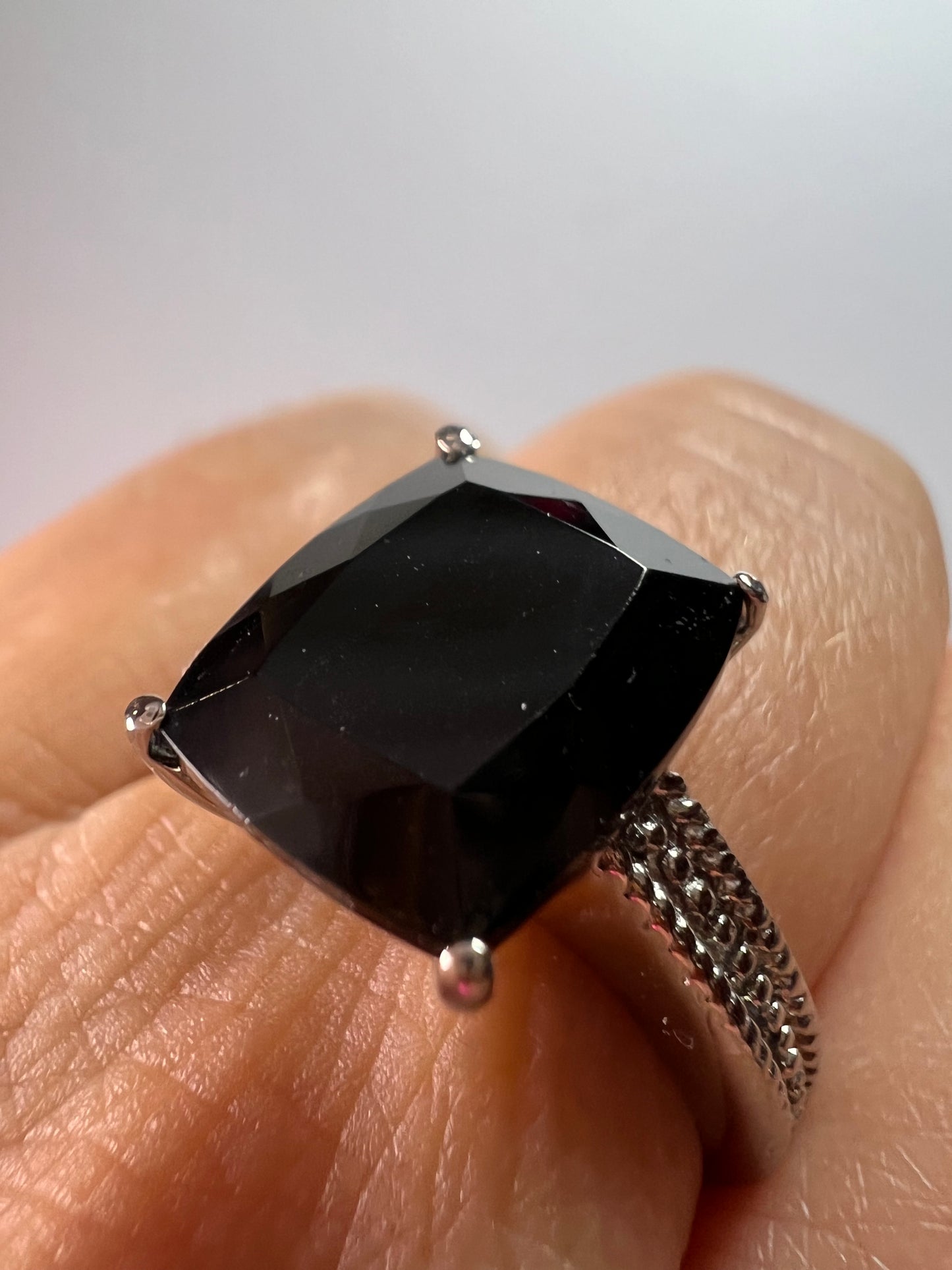 Black spinel in stainless steel ring size 9