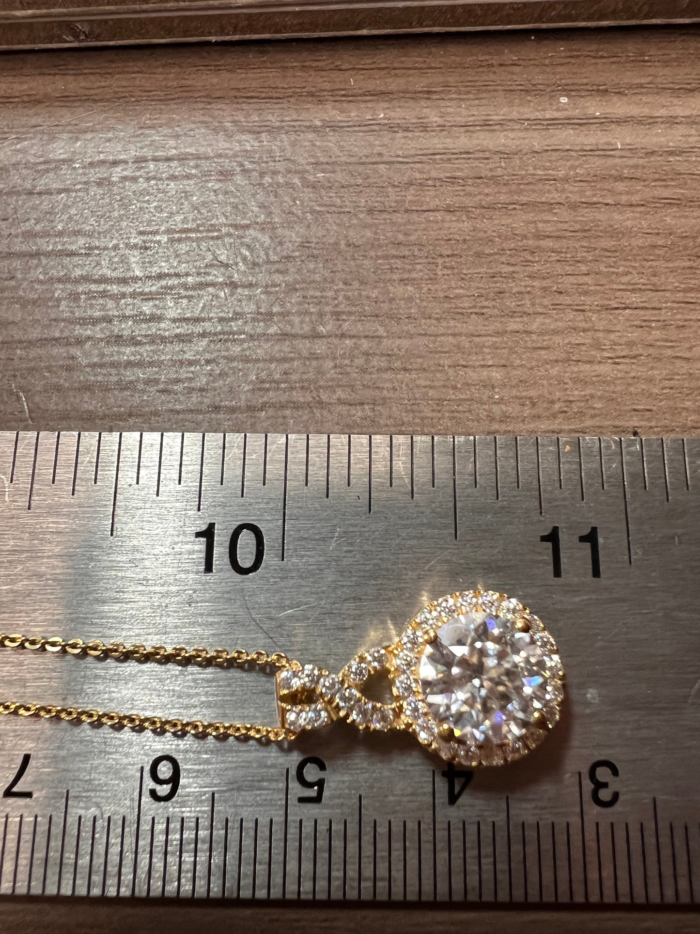 100 facet moissanite pendant necklace in gold over sterling silver