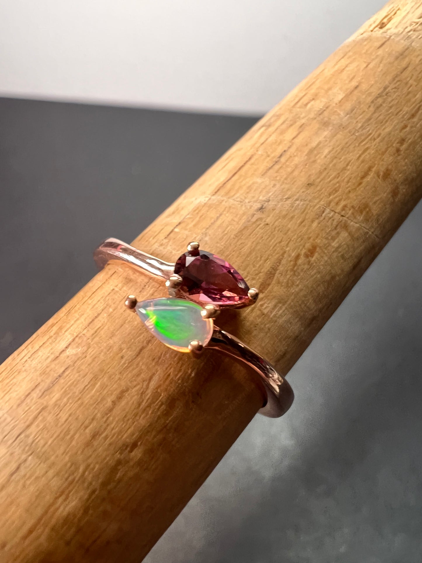 Rubellite and Ethiopian welo opal bypass ring in rose gold vermeil over sterling silver size 7. .35ctw