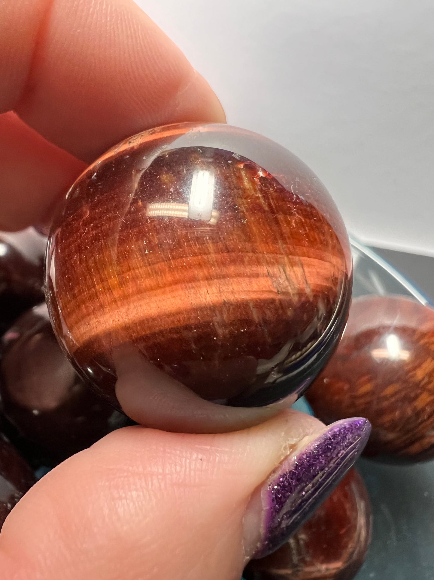 Red tigers eye sphere