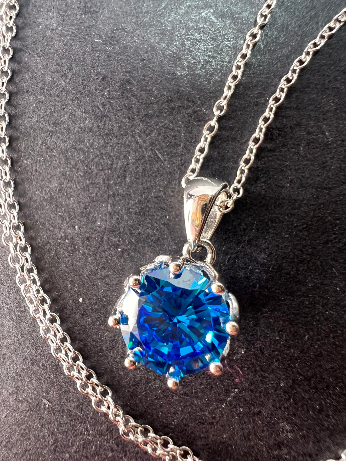 YGI blue CZ rhodium over sterling silver solitaire pendant and chain