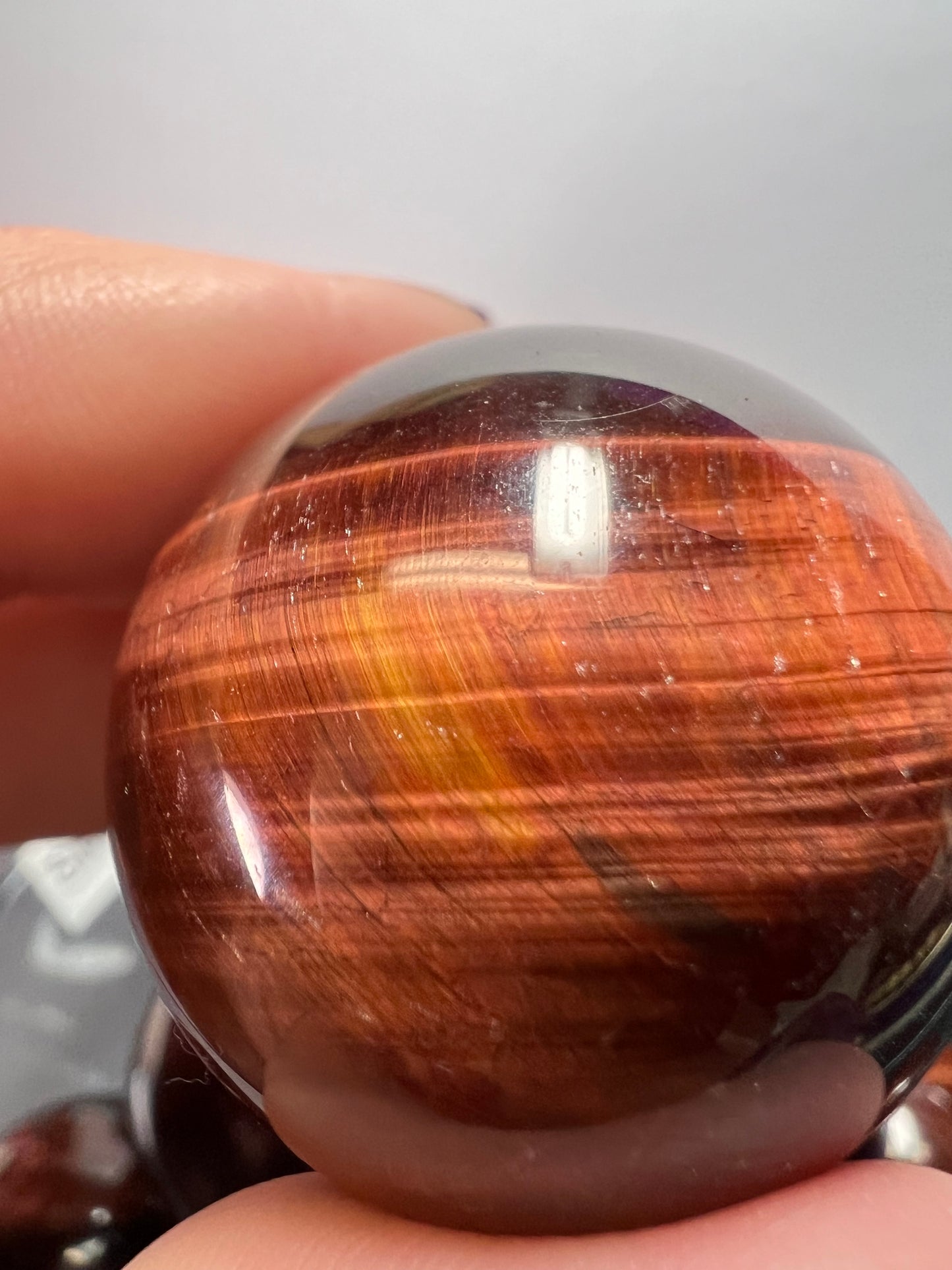 Red tigers eye sphere