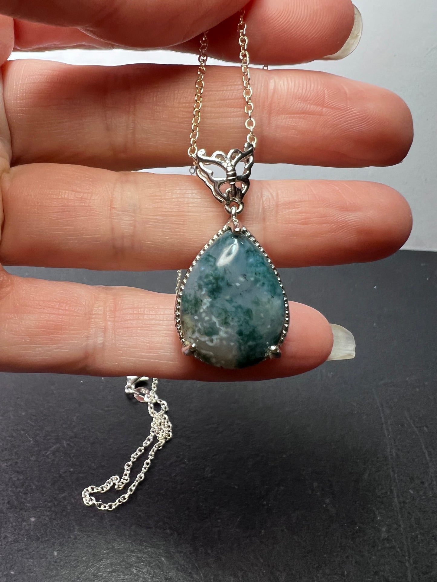 Moss agate teardrop pendant with butterfly in platinum over copper with 18 inch chain