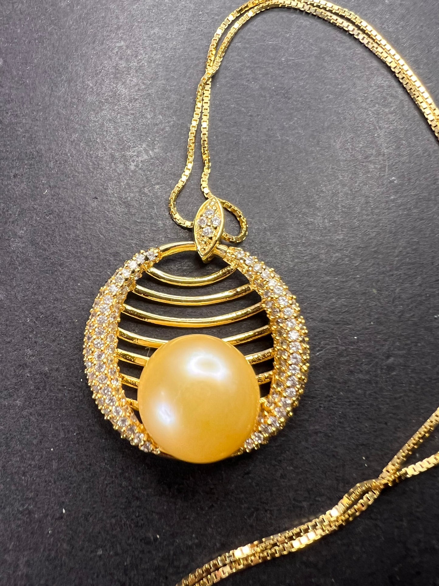 Golden yellow cultured pearl pendant in gold over sterling silver with chain