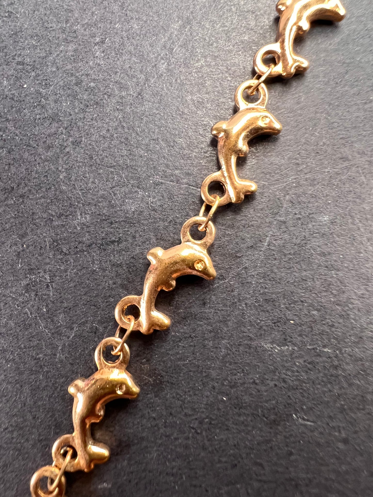 Ion plated rose gold over stainless steel dolphins 20 inch necklace