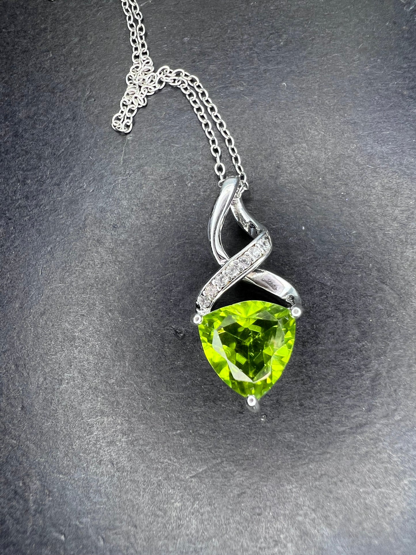 Trilliant cut peridot and sterling silver pendant and 18 inch chain