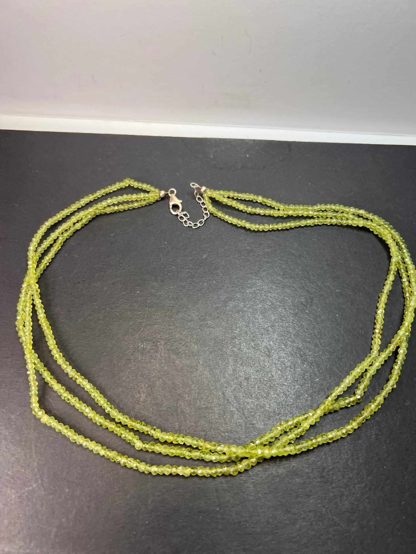 Layered peridot necklace with sterling silver clasp