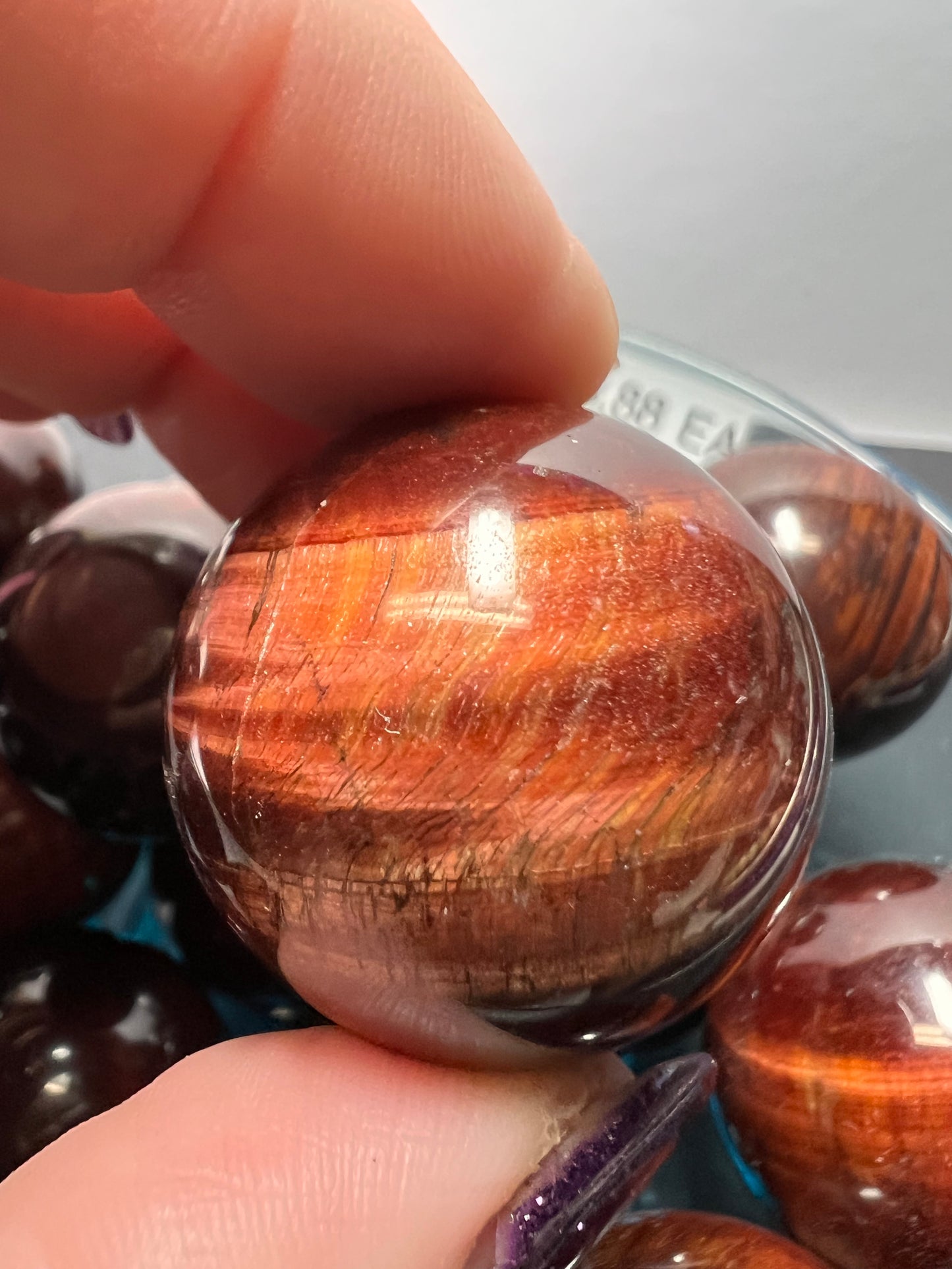 Red tigers eye sphere