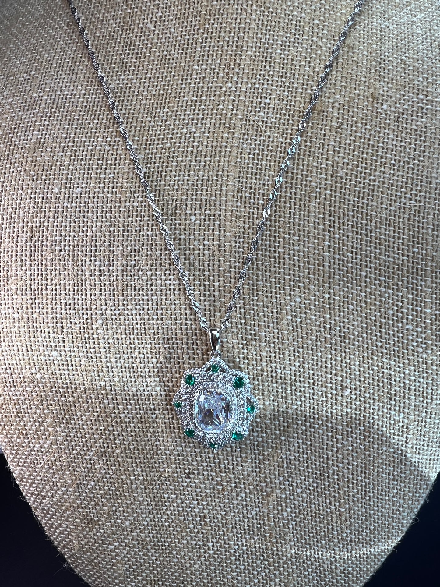 Bella Luce lab created green spinel and diamond simulant rhodium over sterling silver pendant with 18 inch chain necklace