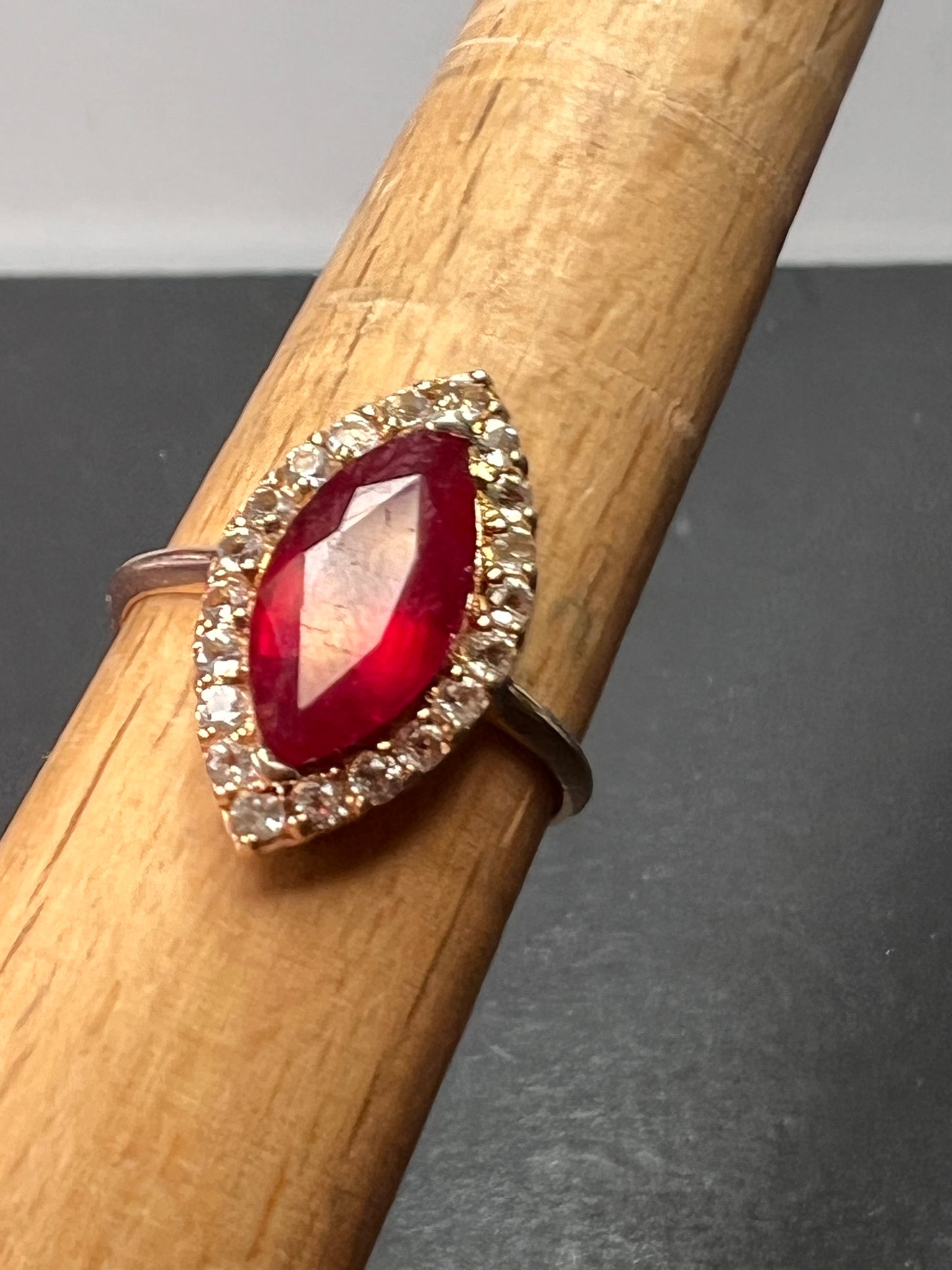 Marquis Ruby and white zircon halo ring in rose gold over sterling silver size 9