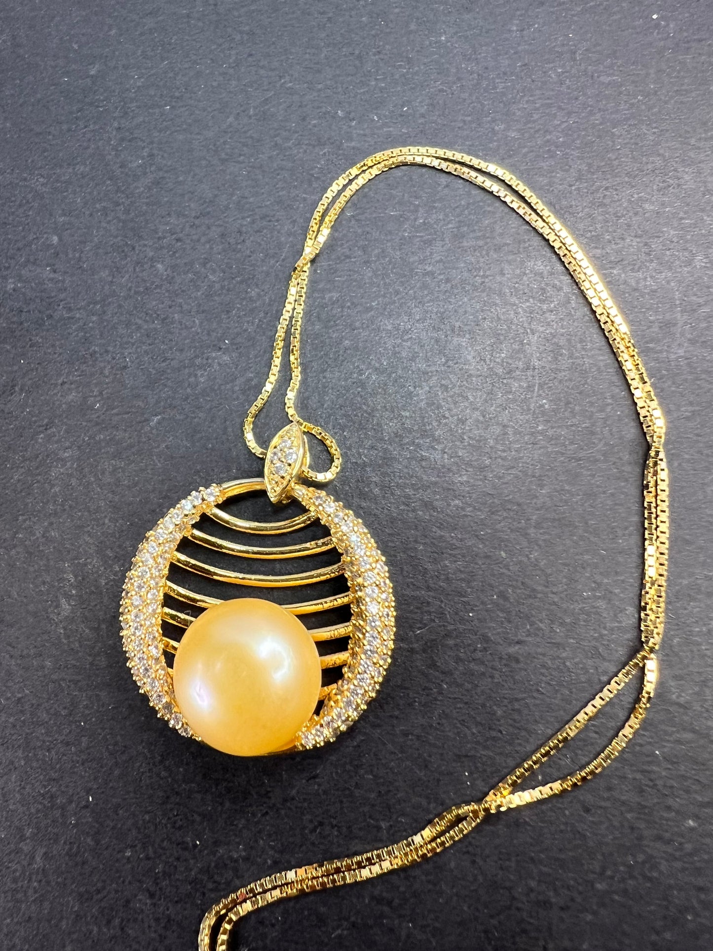 Golden yellow cultured pearl pendant in gold over sterling silver with chain