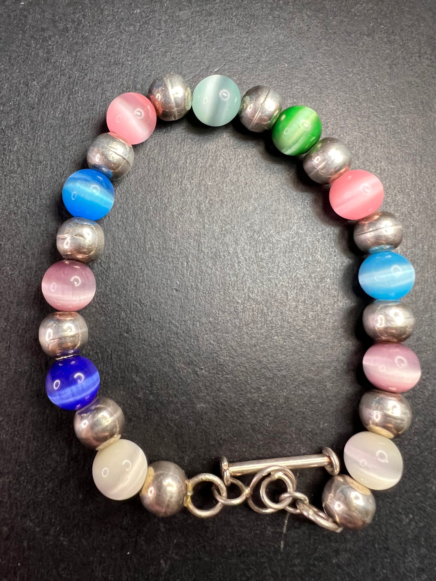 Vintage sterling silver and cats eye glass toggle bracelet