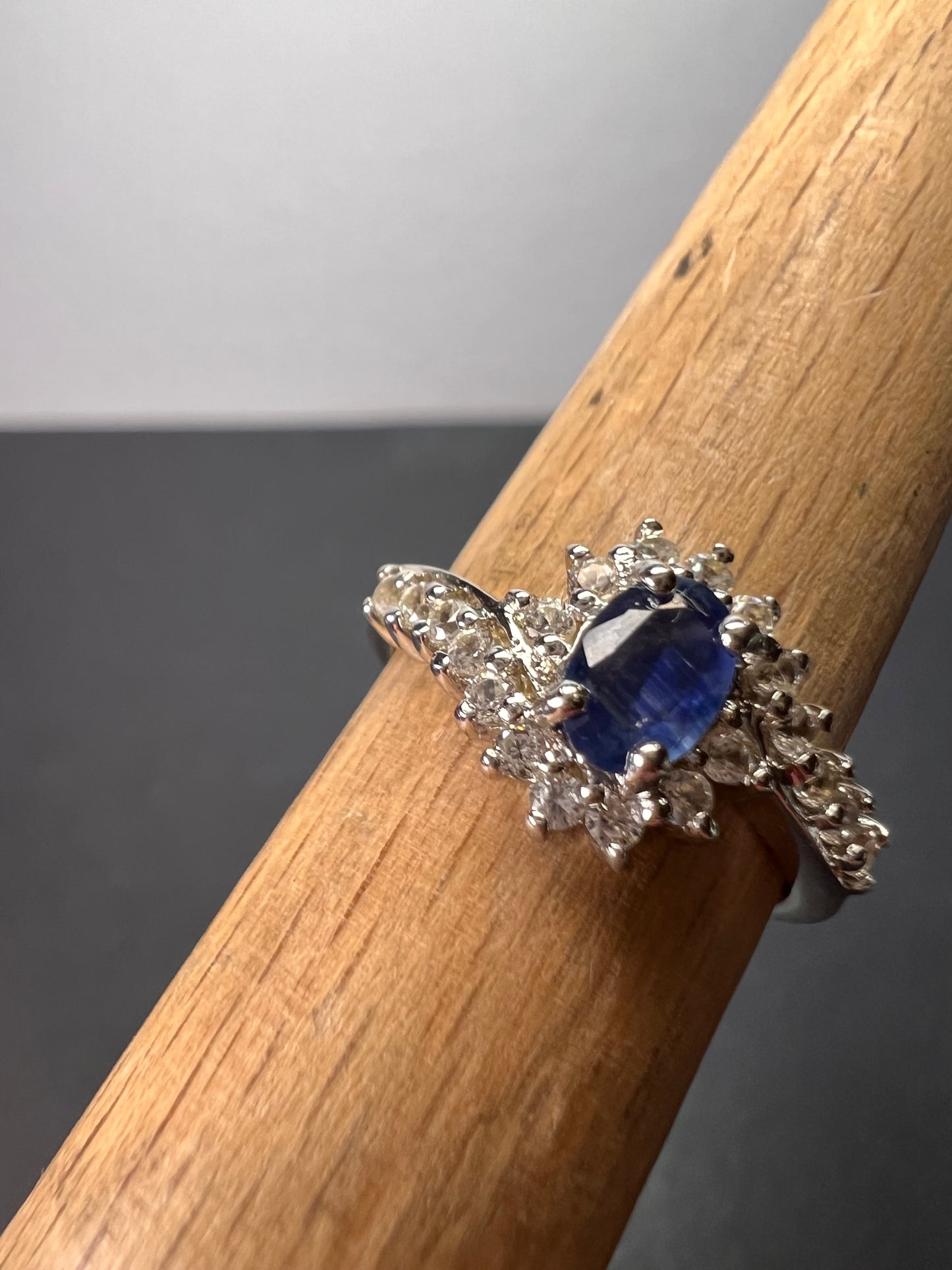 Blue sapphire and zircon floral ring in platinum over sterling silver size 5