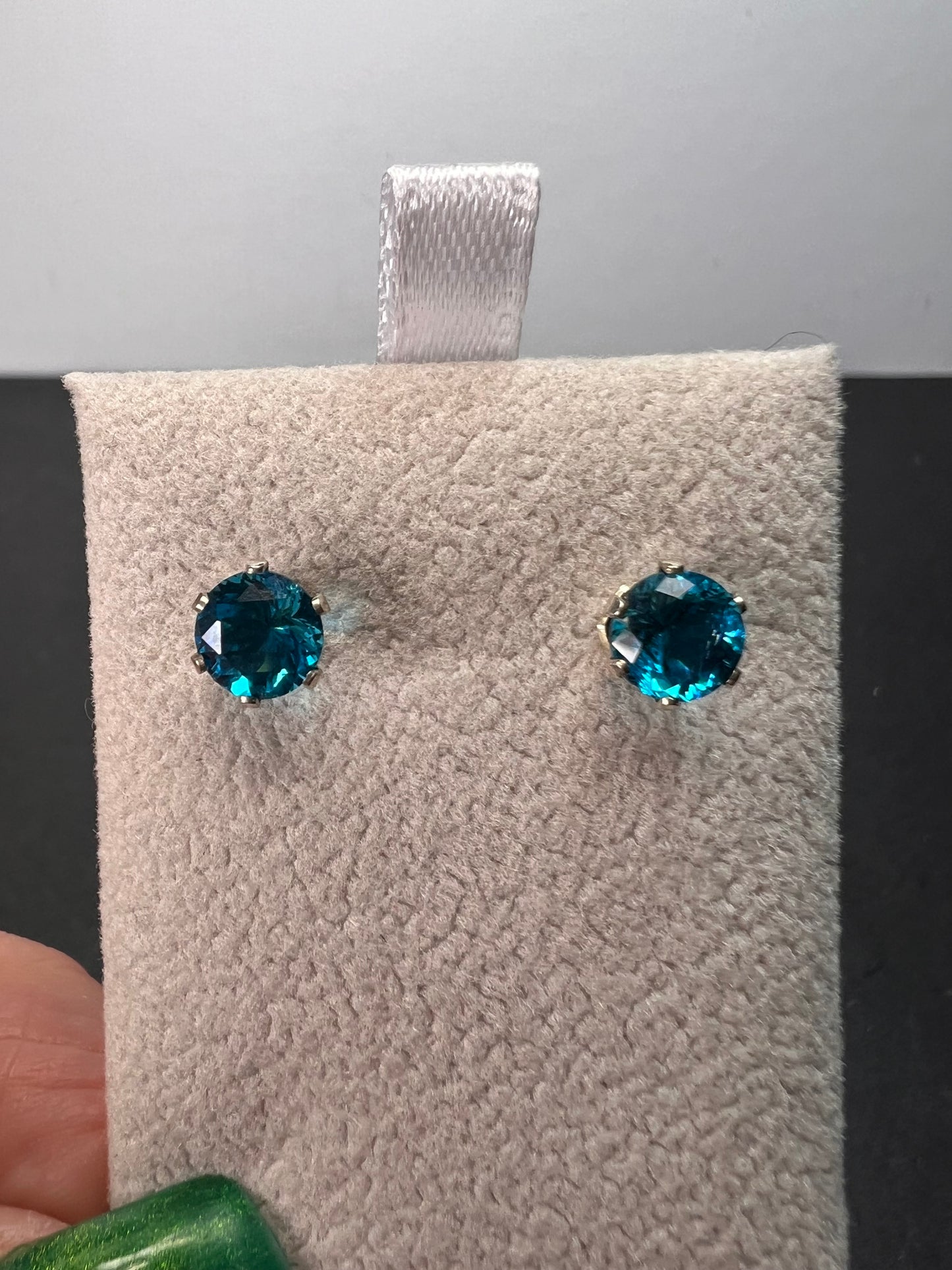 Blue stone stud earrings in sterling silver