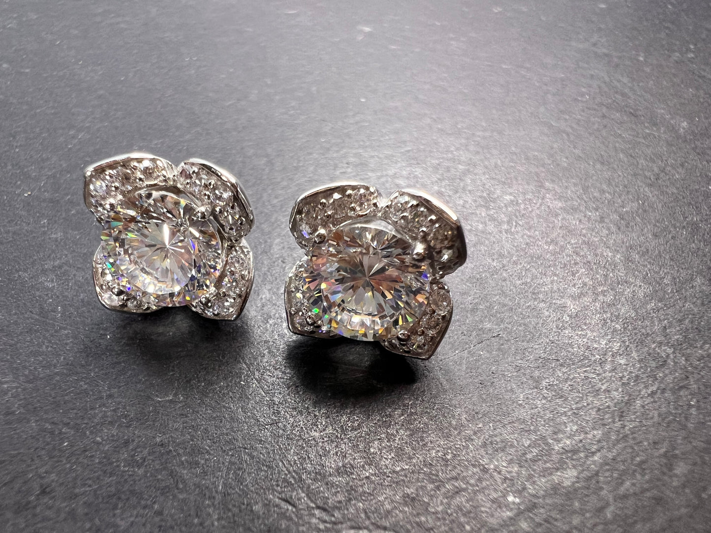 CZ floral styled stud earrings in rhodium over sterling silver