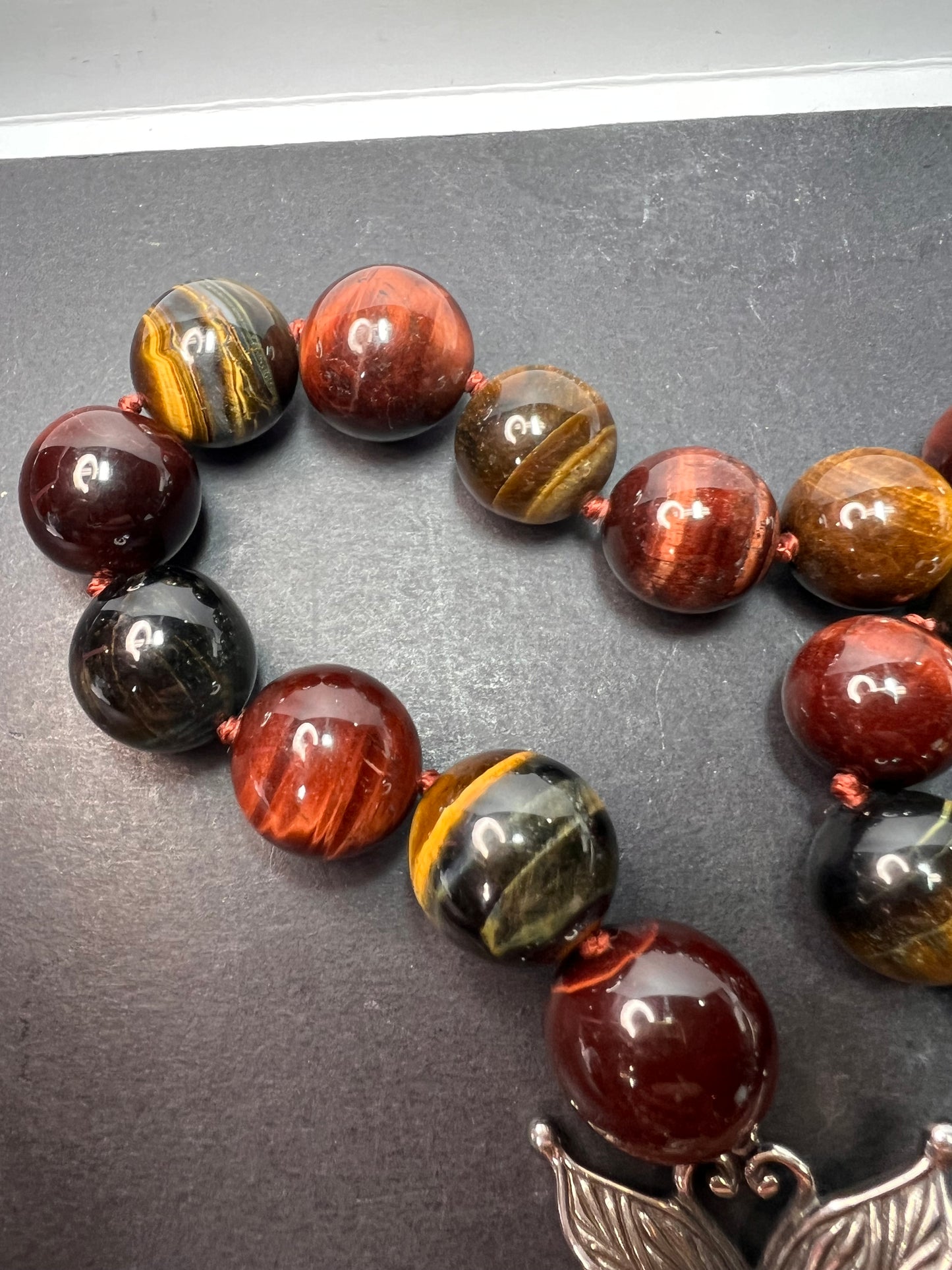 Multi tigers eye beaded knotted necklace with stainless steel toggle clasp