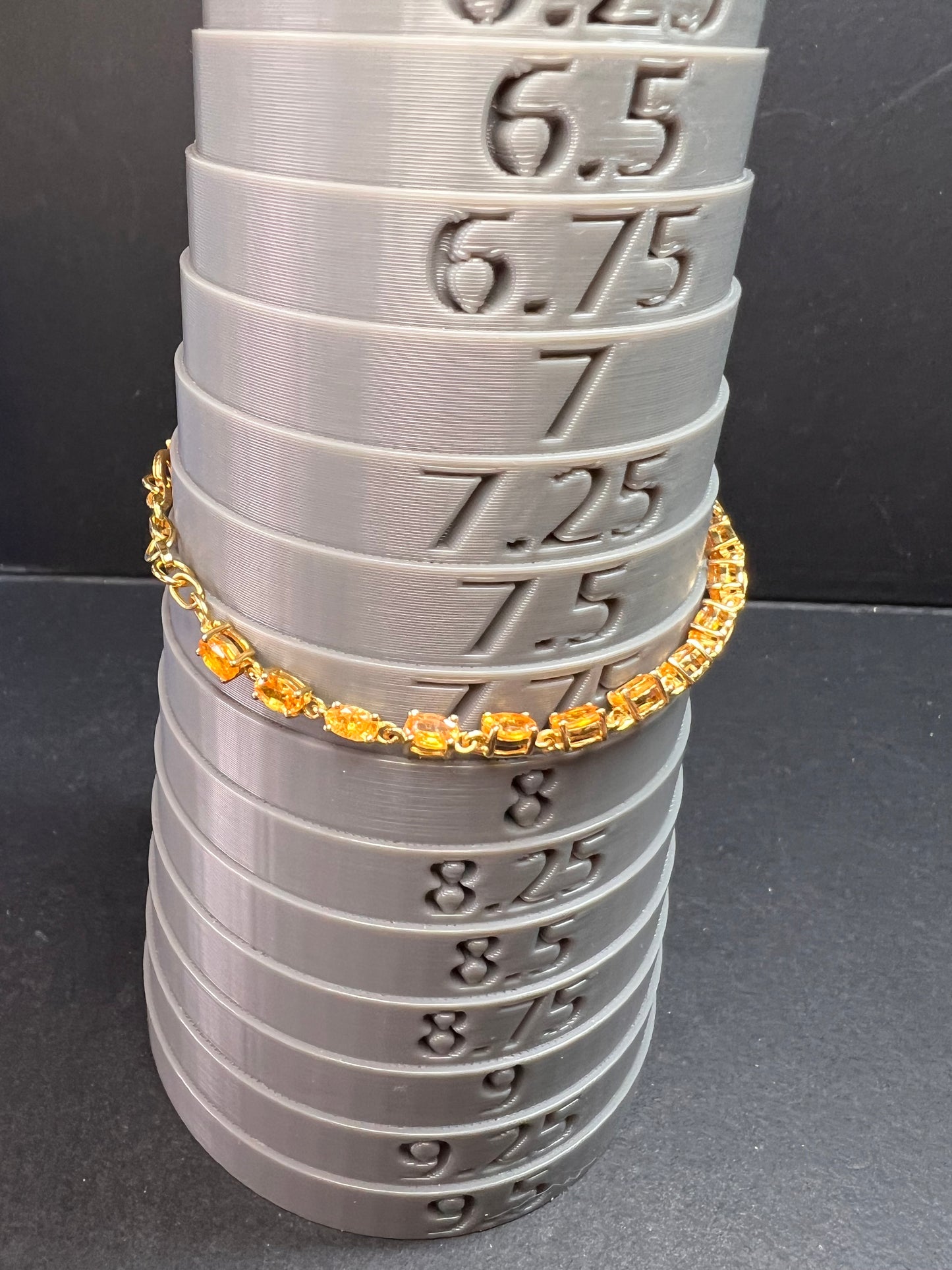 Yellow spessartine garnet tennis bracelet in gold over sterling silver