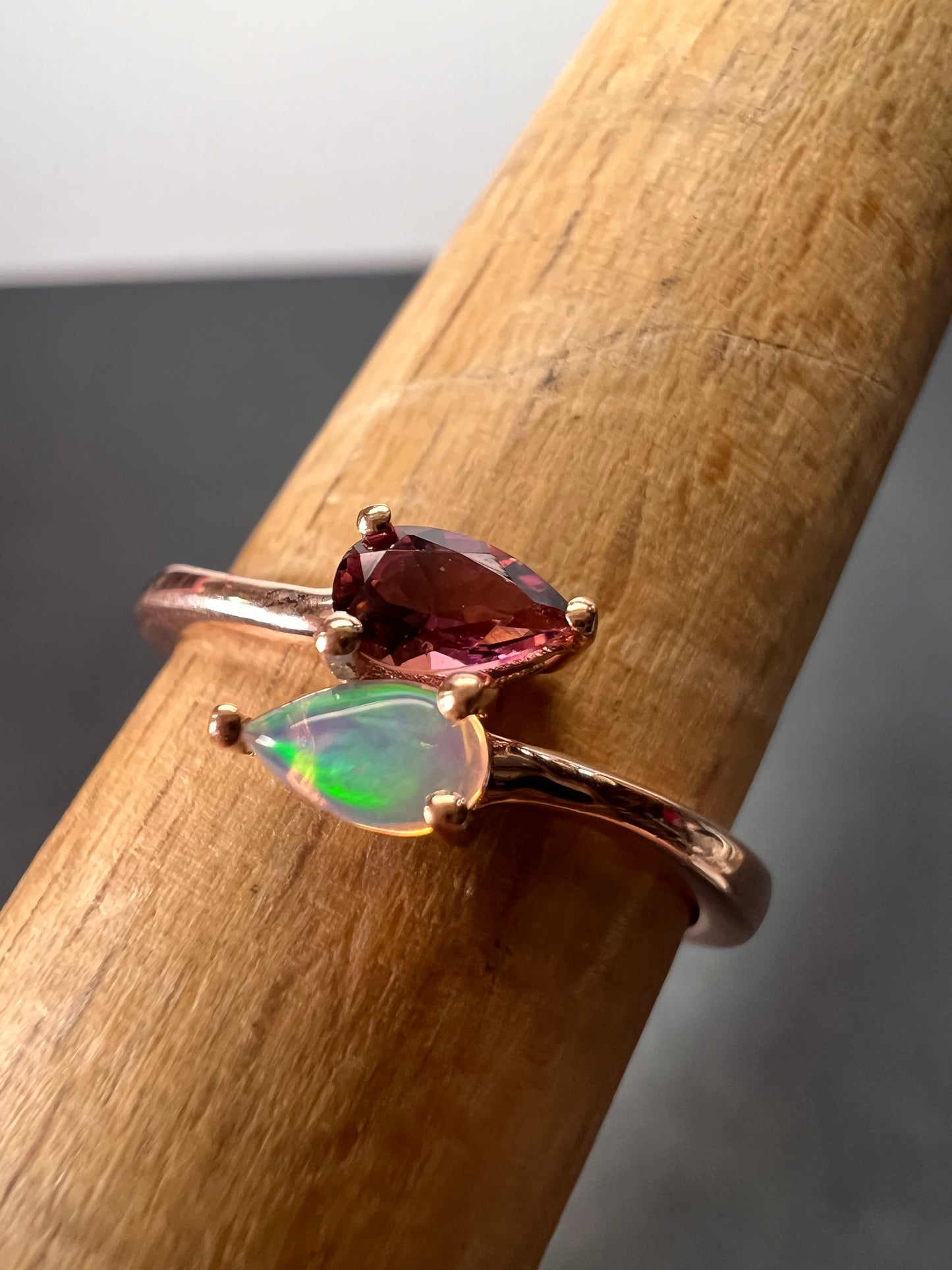 Rubellite and Ethiopian welo opal bypass ring in rose gold vermeil over sterling silver size 7. .35ctw