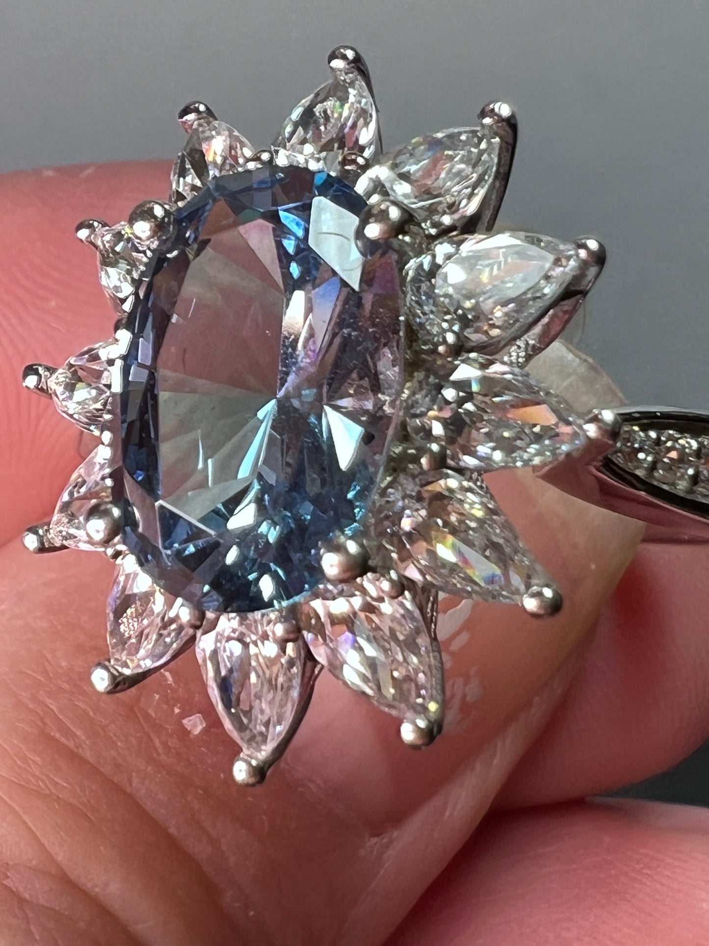 Blue lab spinel and white CZ rhodium over sterling ring size 10