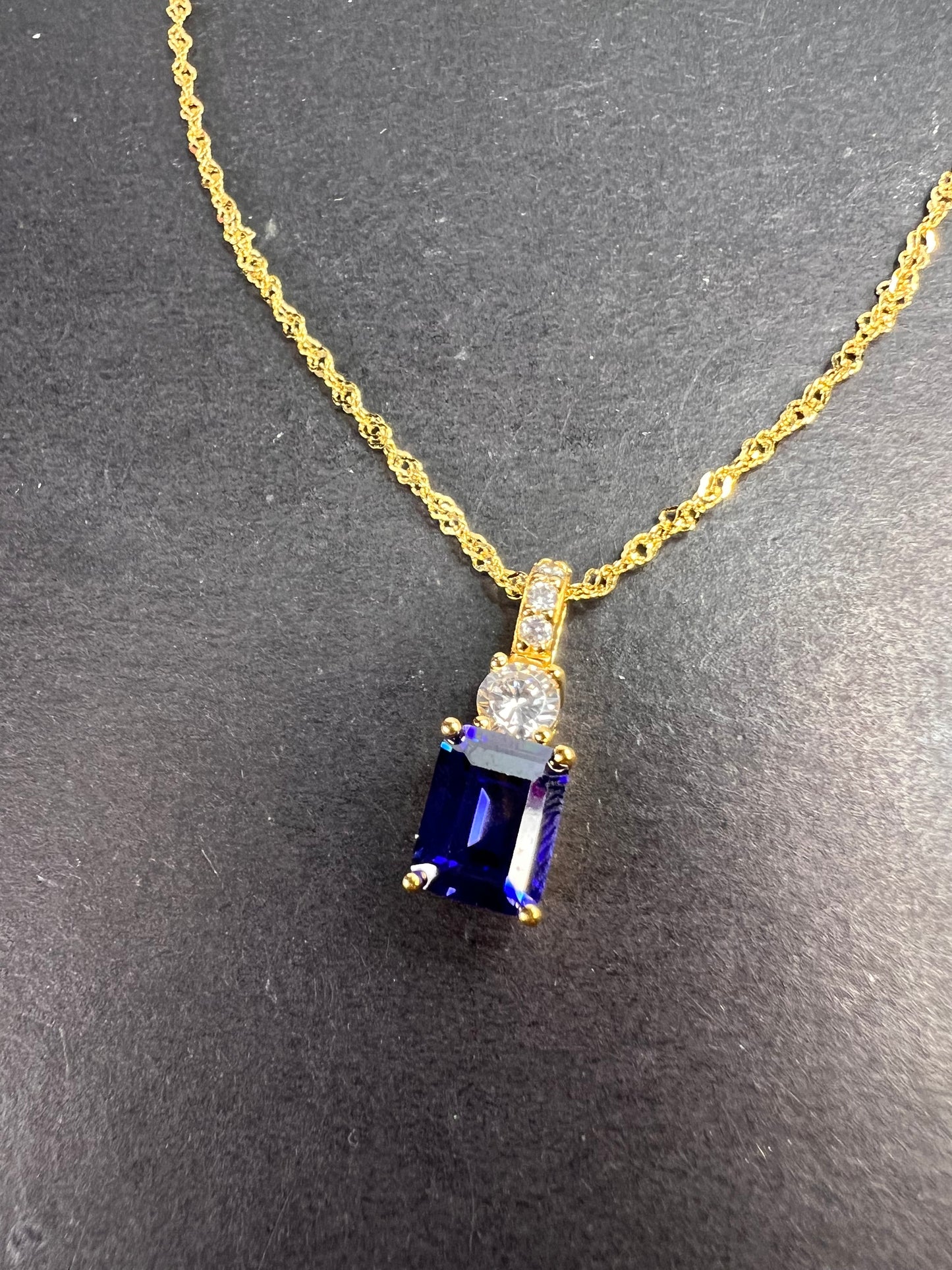 Blue emerald cut CZ pendant and chain necklace in gold over sterling silver 18 inches