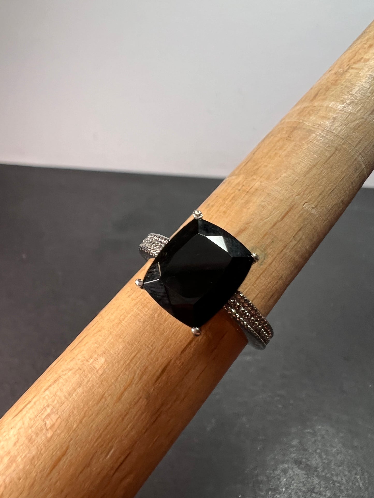 Black spinel in stainless steel ring size 9