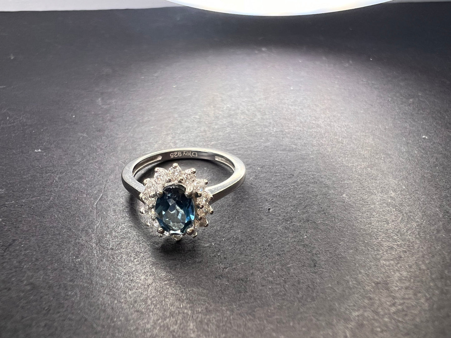 London blue topaz sunburst halo ring in platinum over sterling silver. ctw 1.40 size 5